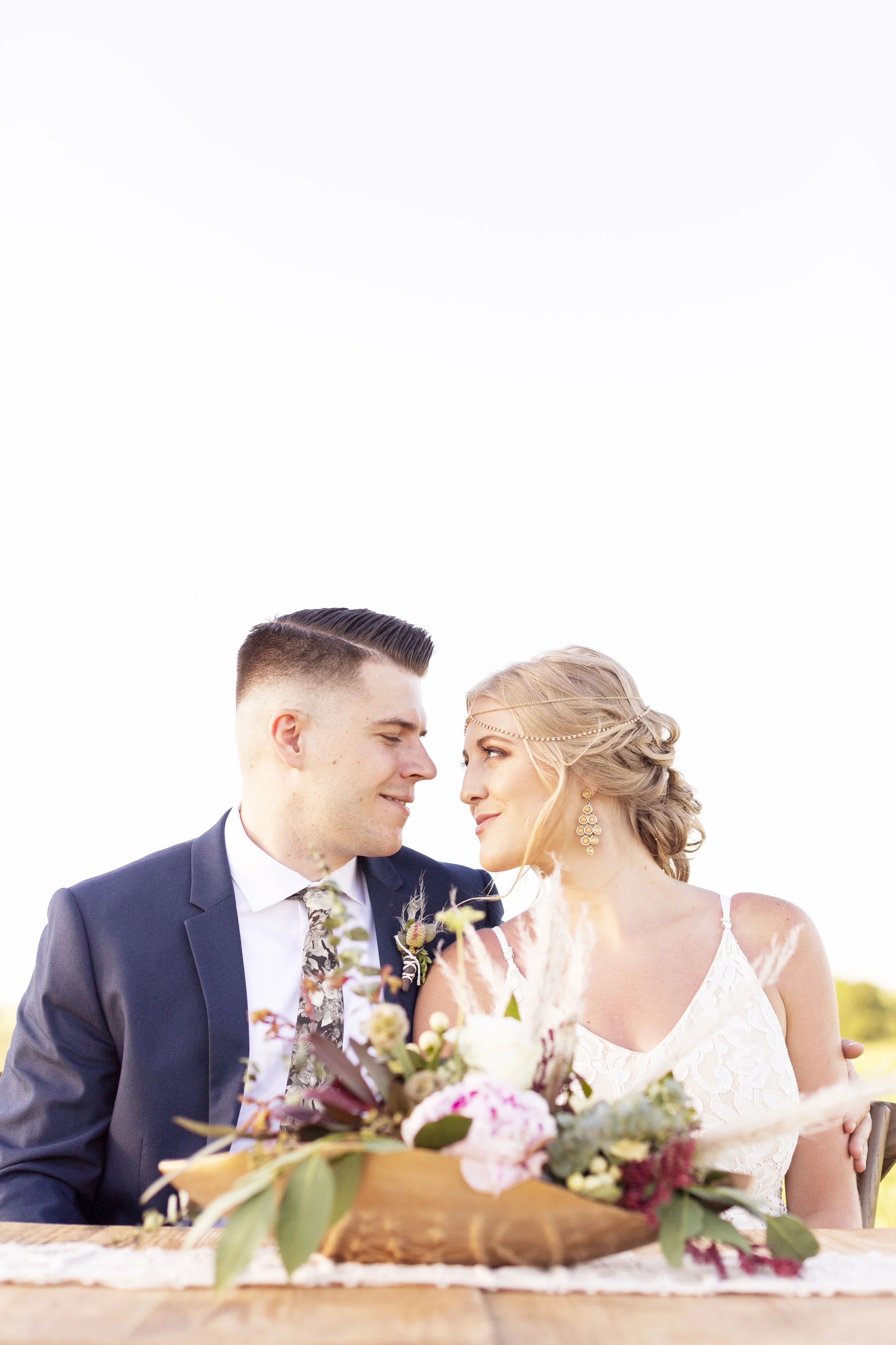 Flowers & Arch: @thistles_pella Photography: @heatherferreria Hair: @alstreet.rmh Make-up: @lc.henderson Calligraphy: @lydiabandstra Table, Rug, Chairs: @pellarental Macrame: @kristajo60