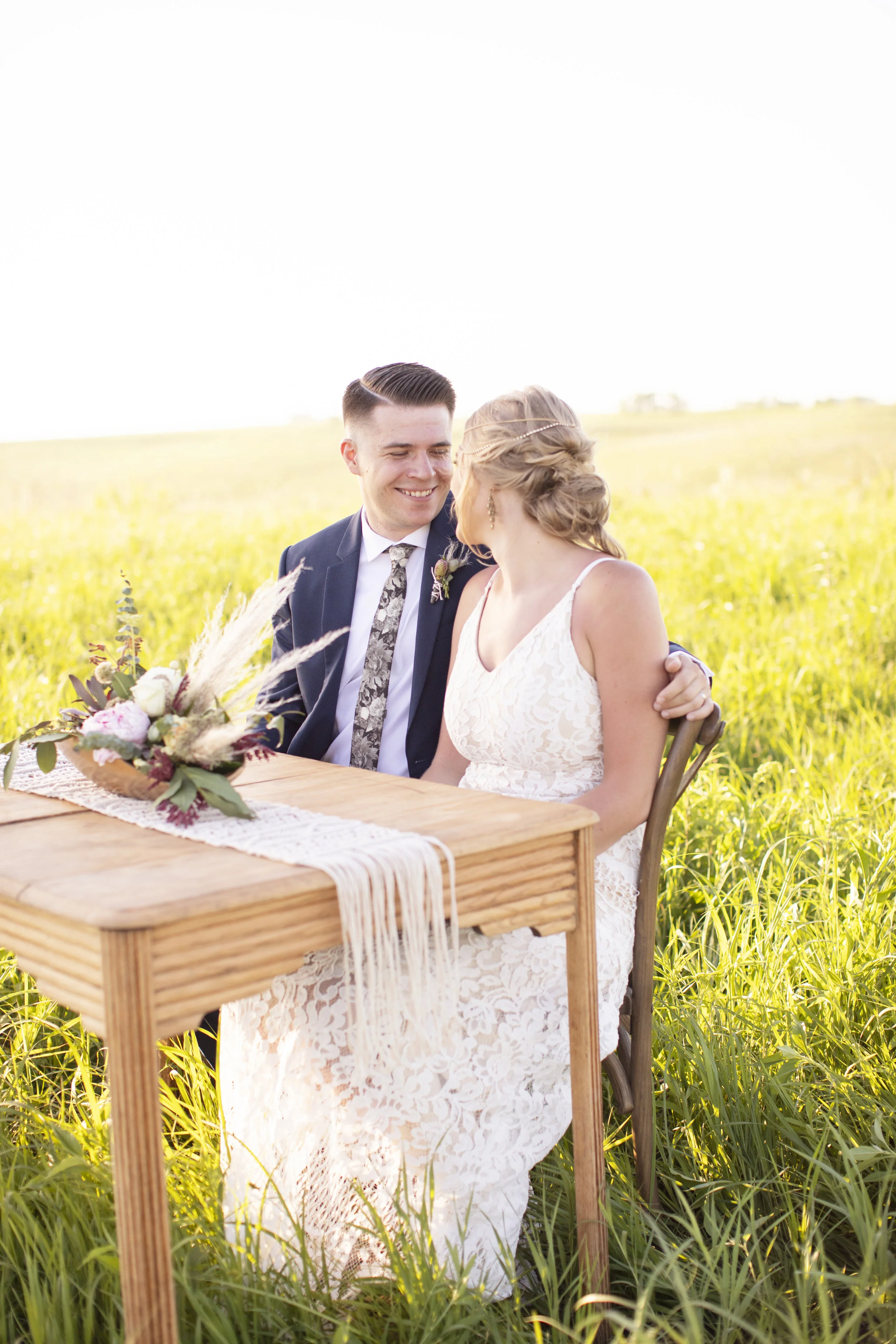 Flowers & Arch: @thistles_pella Photography: @heatherferreria Hair: @alstreet.rmh Make-up: @lc.henderson Calligraphy: @lydiabandstra Table, Rug, Chairs: @pellarental Macrame: @kristajo60