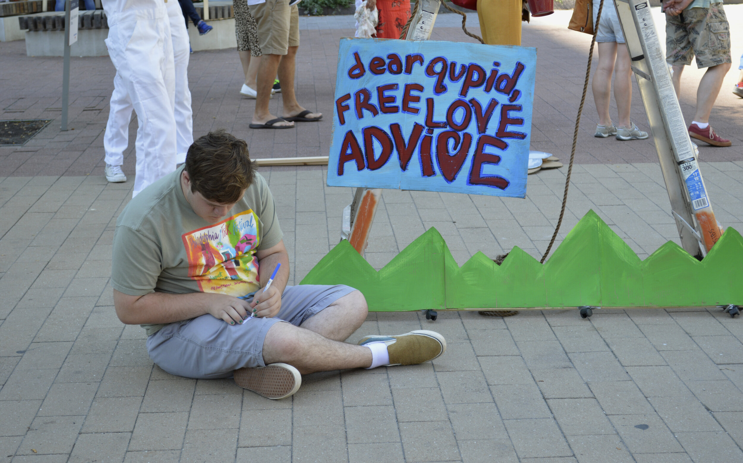  Audience members were invited to pose their love advice questions to qupid and wait for a response from above. 