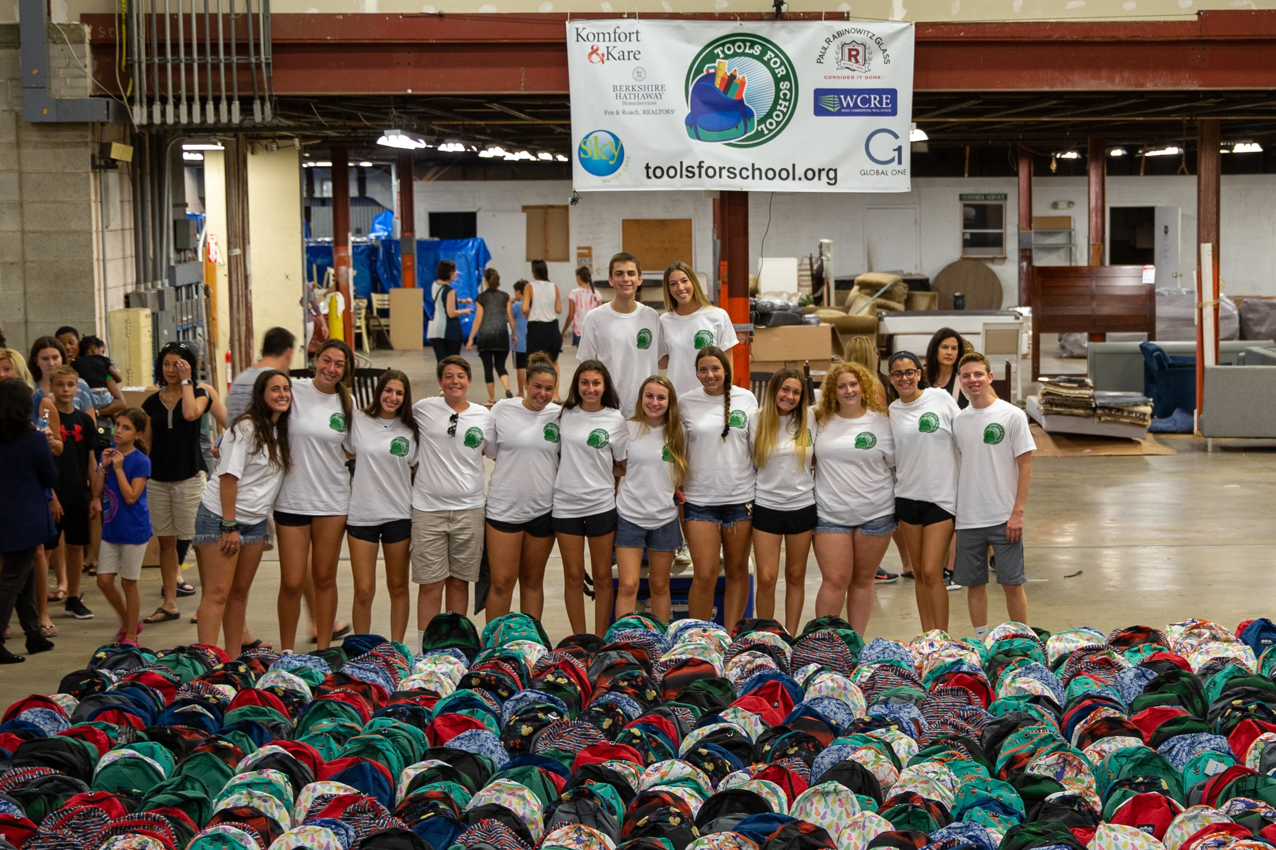 Some members of the 2017-2018 Tools for School teen board at our 2018 Packing Event on August 19, 2018