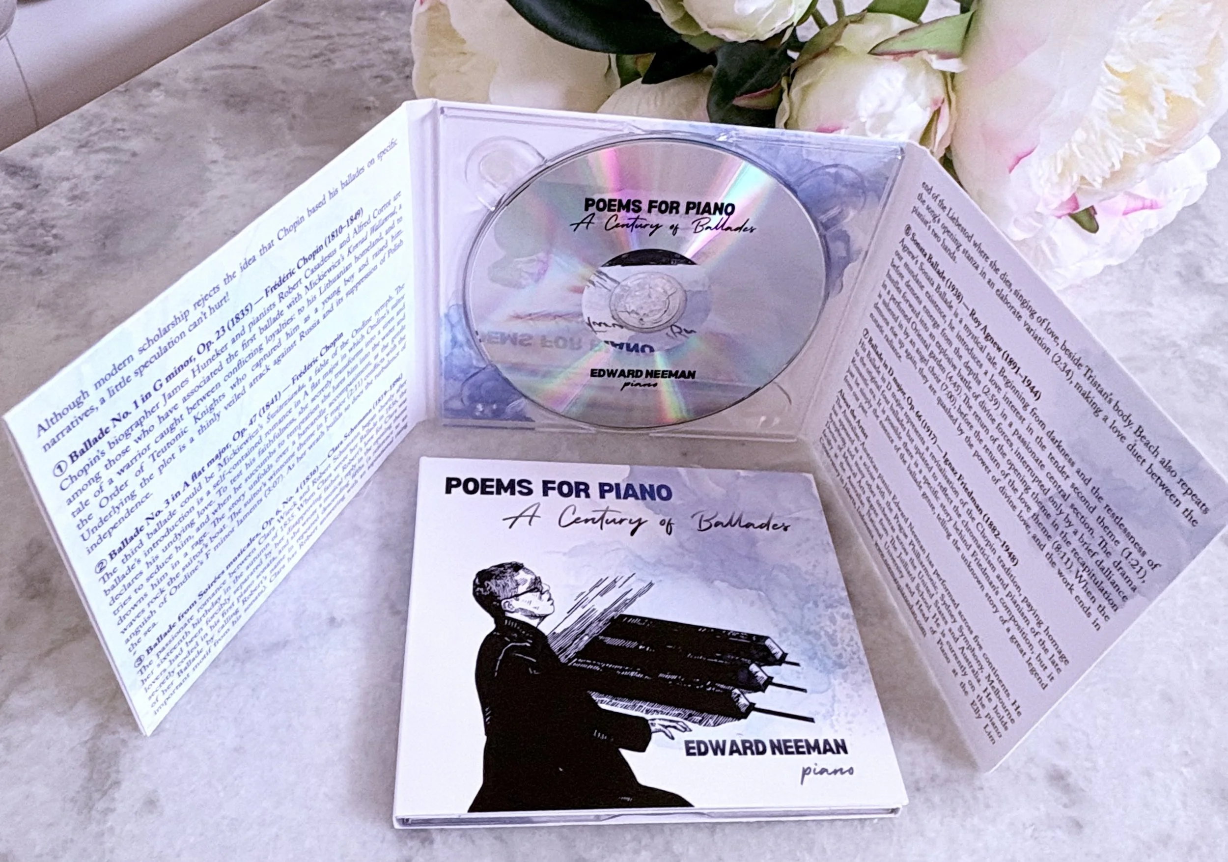Poems CDs on table.jpg
