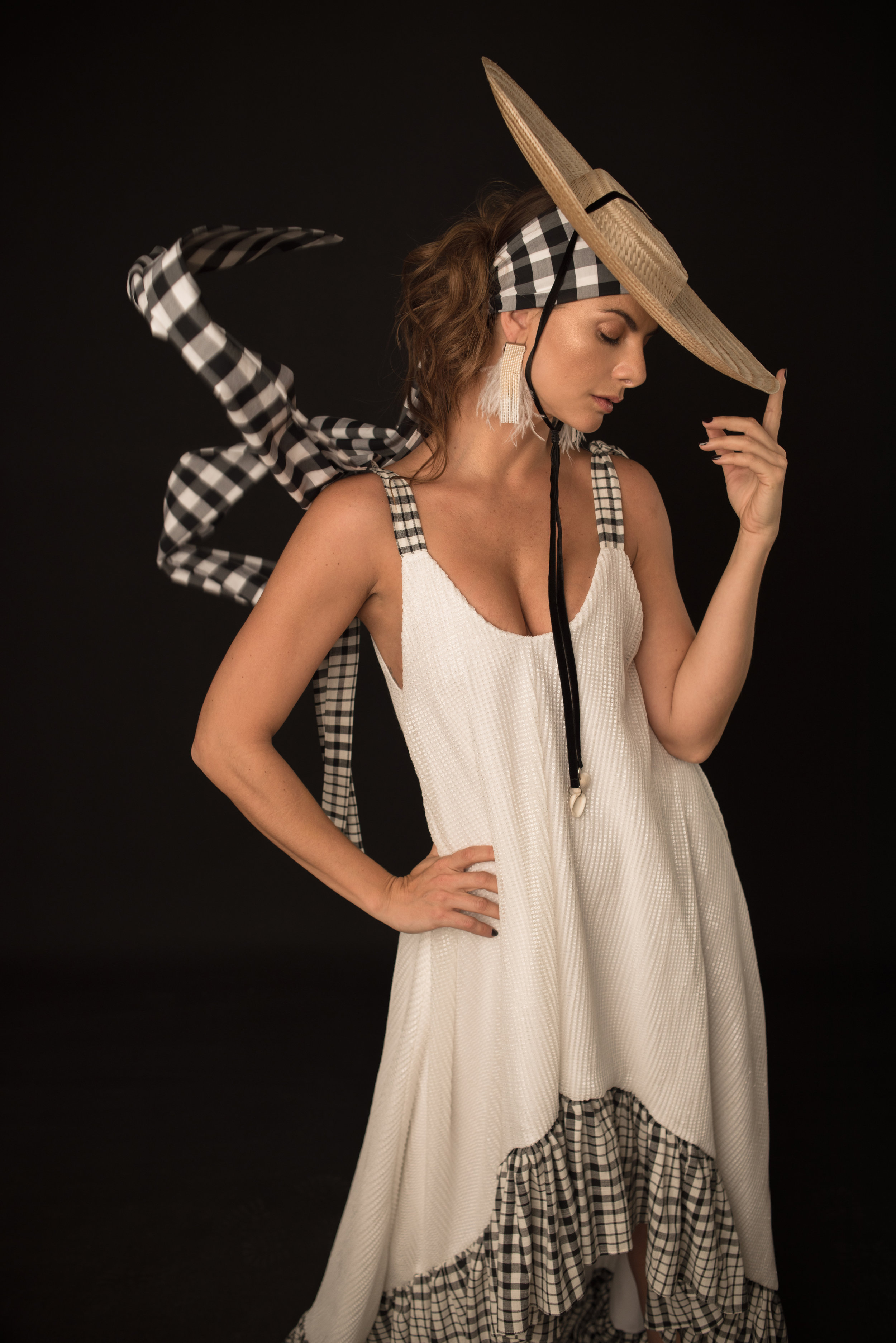 Dress. Alexandra Bueno / Hat. Roma Hatmakers for La Couture Maison / Earrings. Adriana Tavera