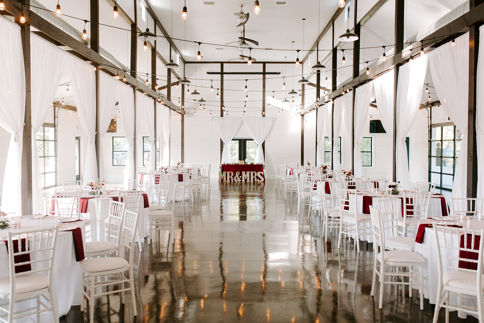Wedding Venues in Tulsa white barn Dream Point Ranch 11.jpg