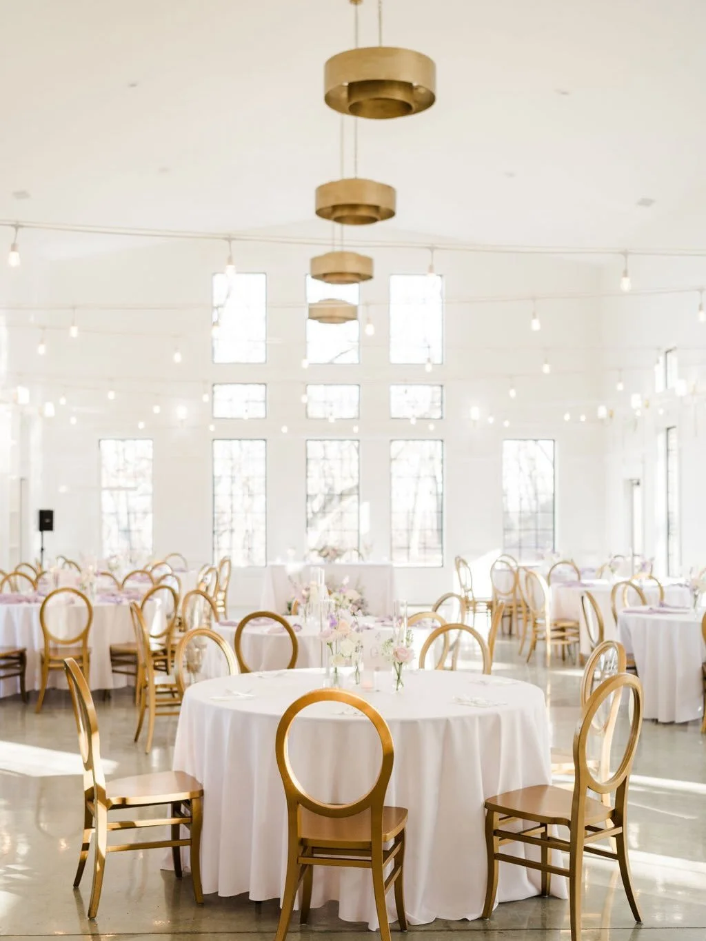 Not into the usual winter wedding style? Winter weddings don&rsquo;t have just one look! These purples, pinks and whites bring a soft elegance to the space, and simple details in Riverbend Chapel elevate it effortlessly. Visit our website and click o