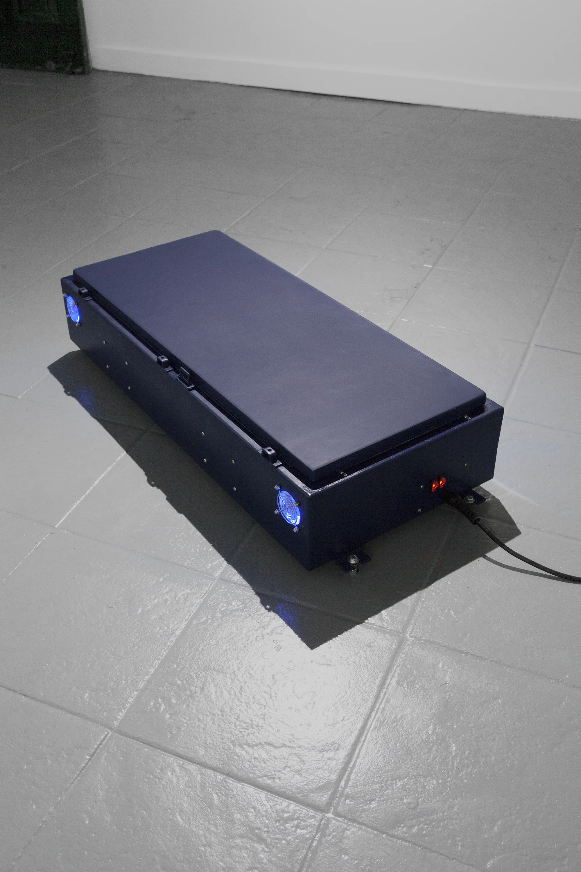 The Black Critique, 2017 Steel electrical enclosure, paint, germicidal UV light bulbs, case fans, USB outlets, electrical wire, power cord (SLEEPCENTER, NY), Photo: Ryota Sato