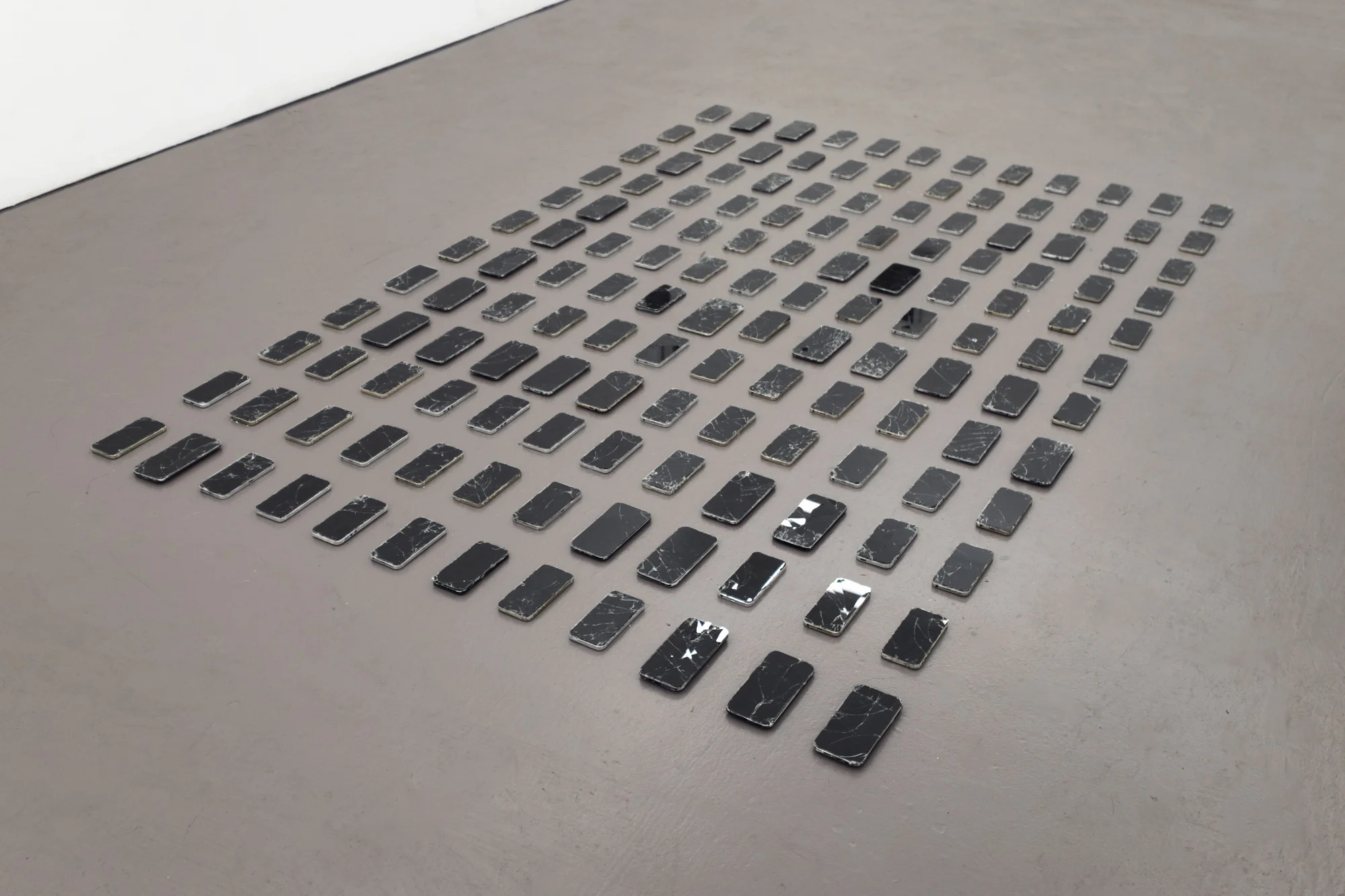 No State , 2018 Aluminum phone casings, silicone, glass (photo courtesy HOUSING, Brooklyn, NY)