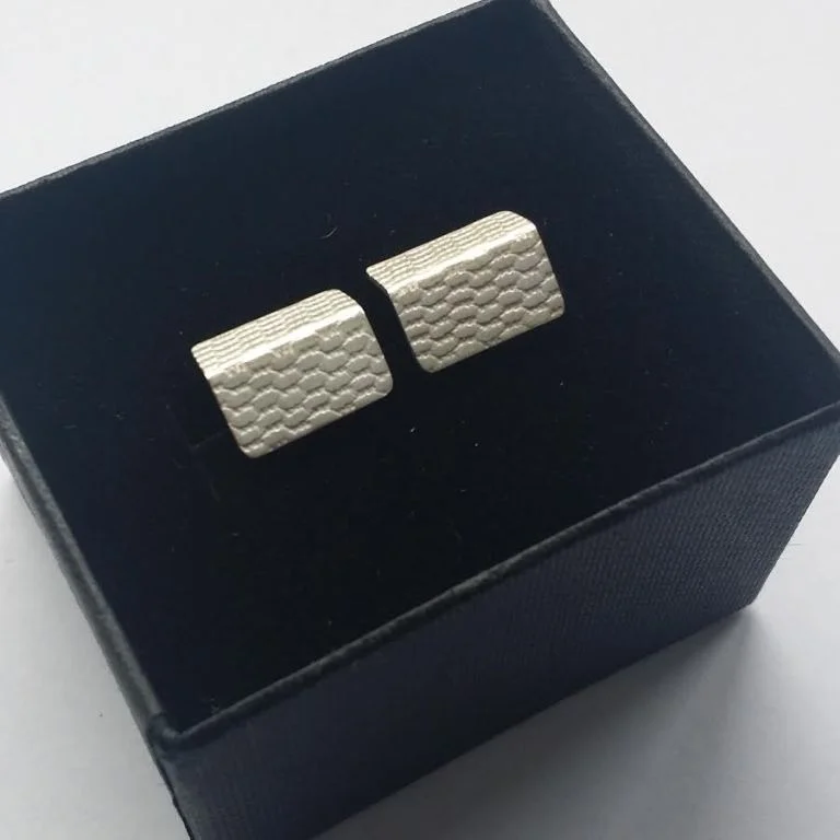 DLG-046 108 EarringsFoldTextured studs 2.jpg