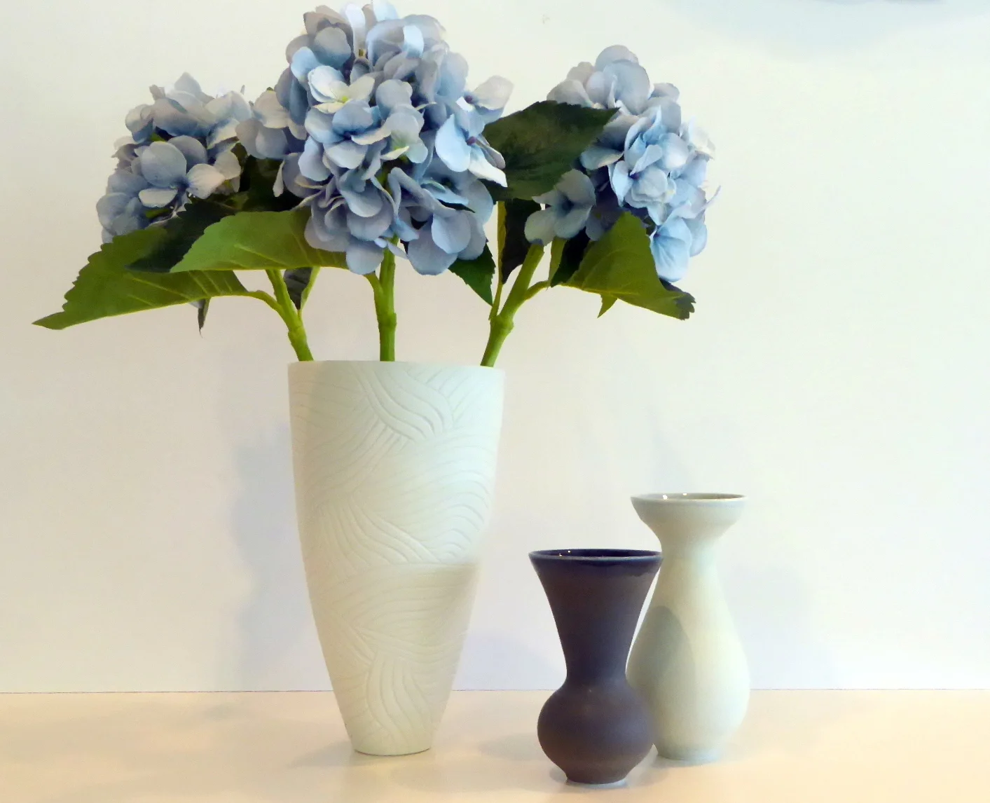 Beautiful carved Vase by Kate McIntyre and Vases by Rachel Carter