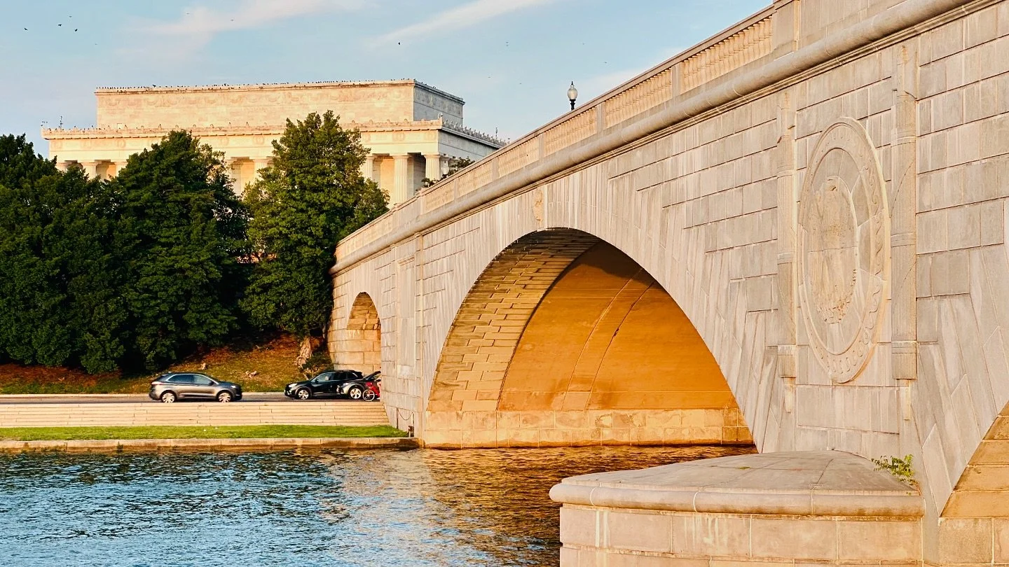 Sun setting low enough to illuminate the underside of Memorial Bridge.