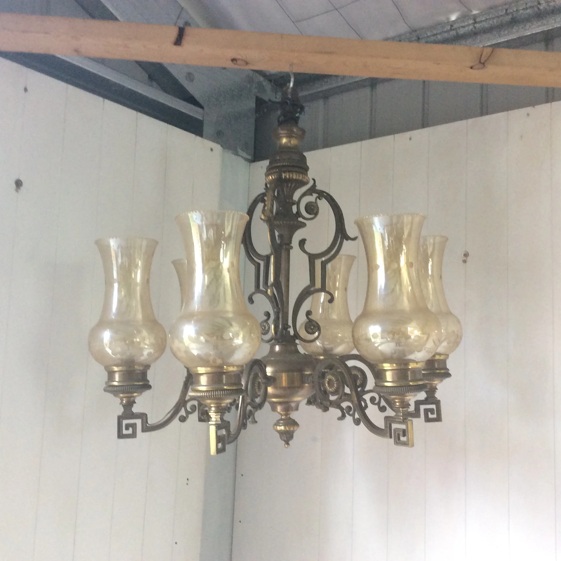 Six arm metal light.