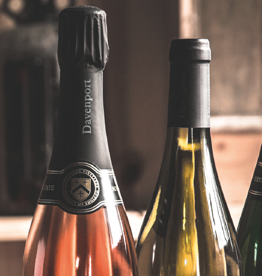 Davenport Vineyards - Product photography, collateral design, concept development Davenport Vineyards is one of the oldest organic wine producers in the UK supplying London's Michelin Starred restaurants. Travelling man created a new brand image set as well as collateral design