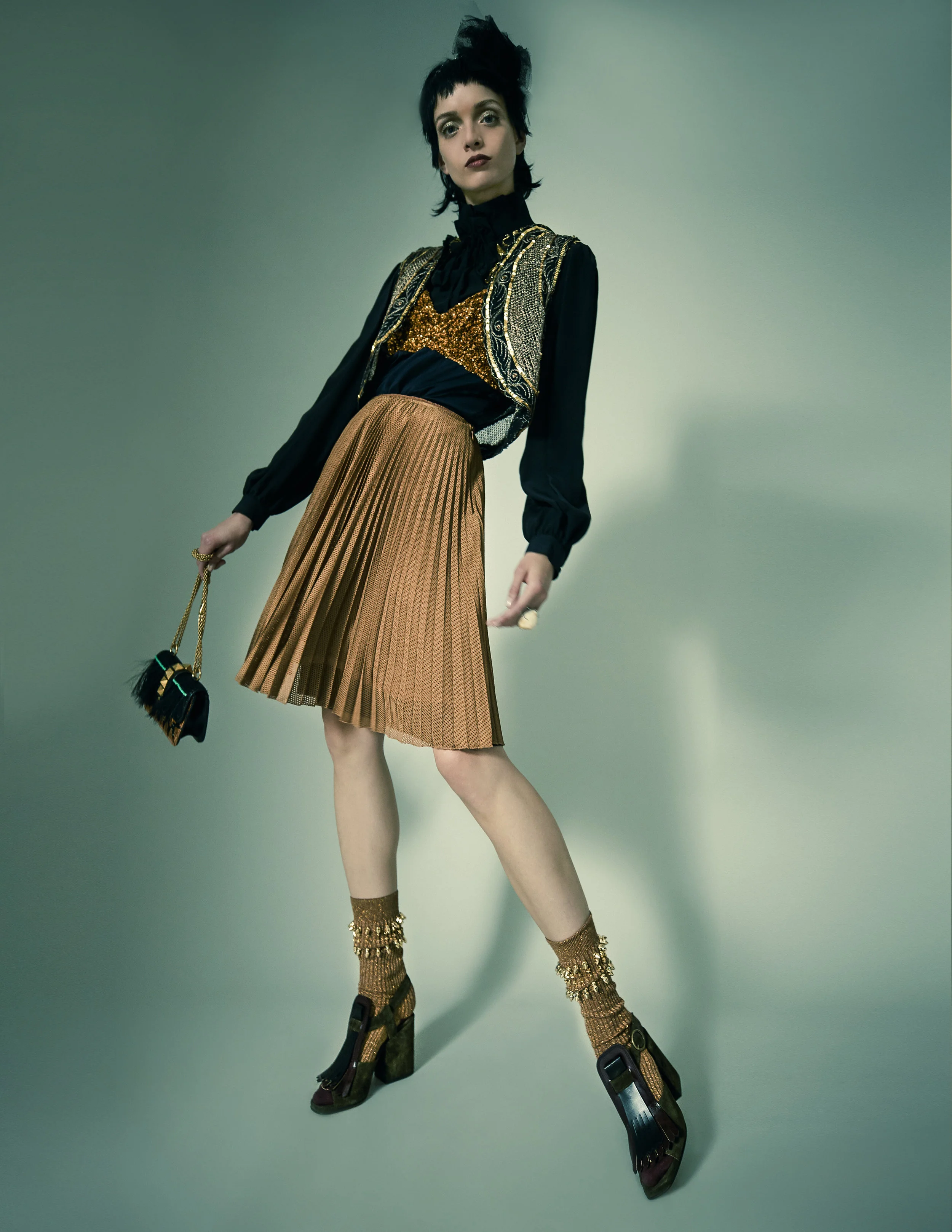 Skirt – PradaShirt – Dega Dress – Dries Van Noten Gilet – Laurence Bras Bag – Valentino Ring – Alexander McQueen Headpiece – Lanvin Socks – Benedict