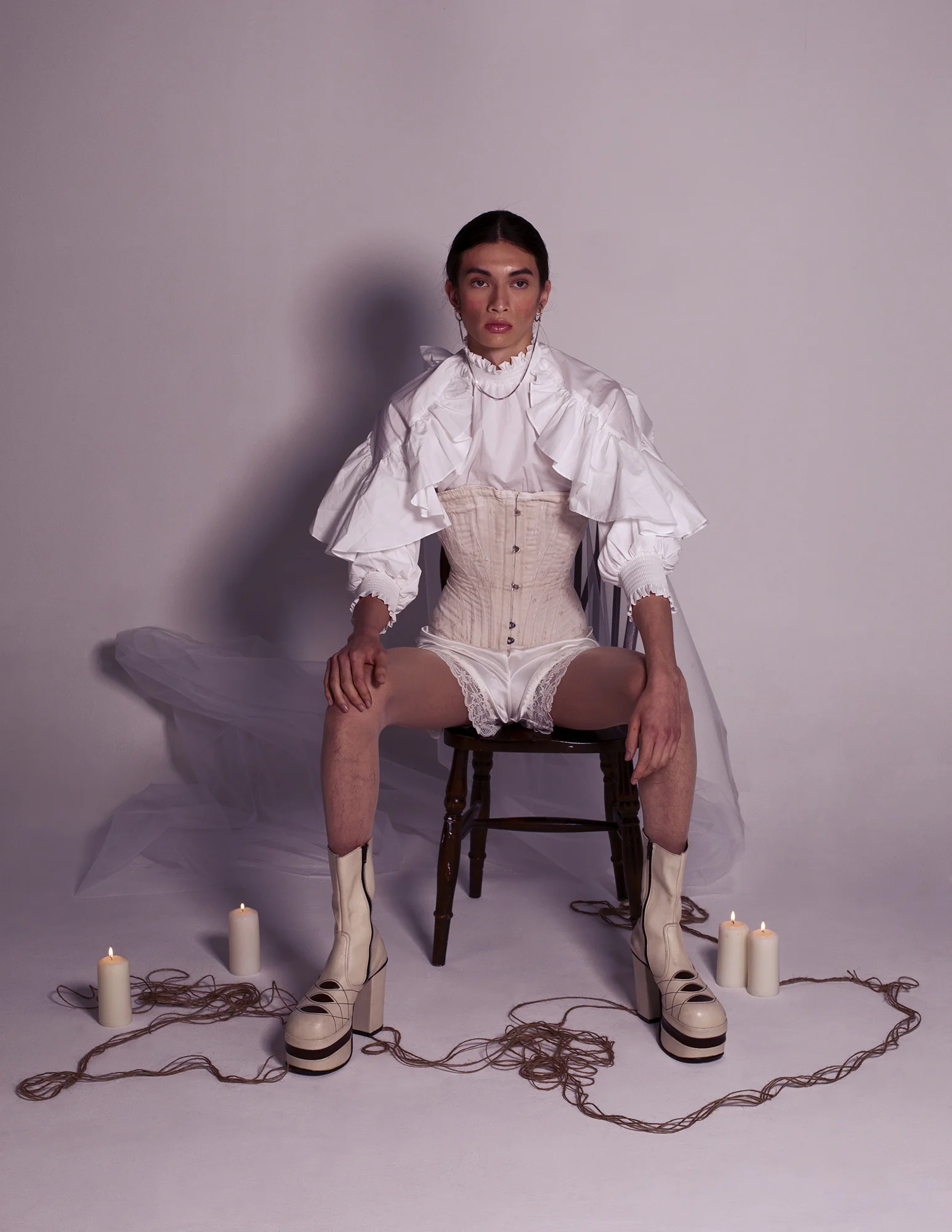Ruffle Cotton Poplin Blouse MAJE Vintage Victorian Corset ANGELS FANCY DRESS Silk Lace Shorts INTISSIMI Fair Nude Tights STYLIST’s OWN White High Top Boots ANGELS FANCY DRESS Double Hoop Earrings SLIM BARRETT