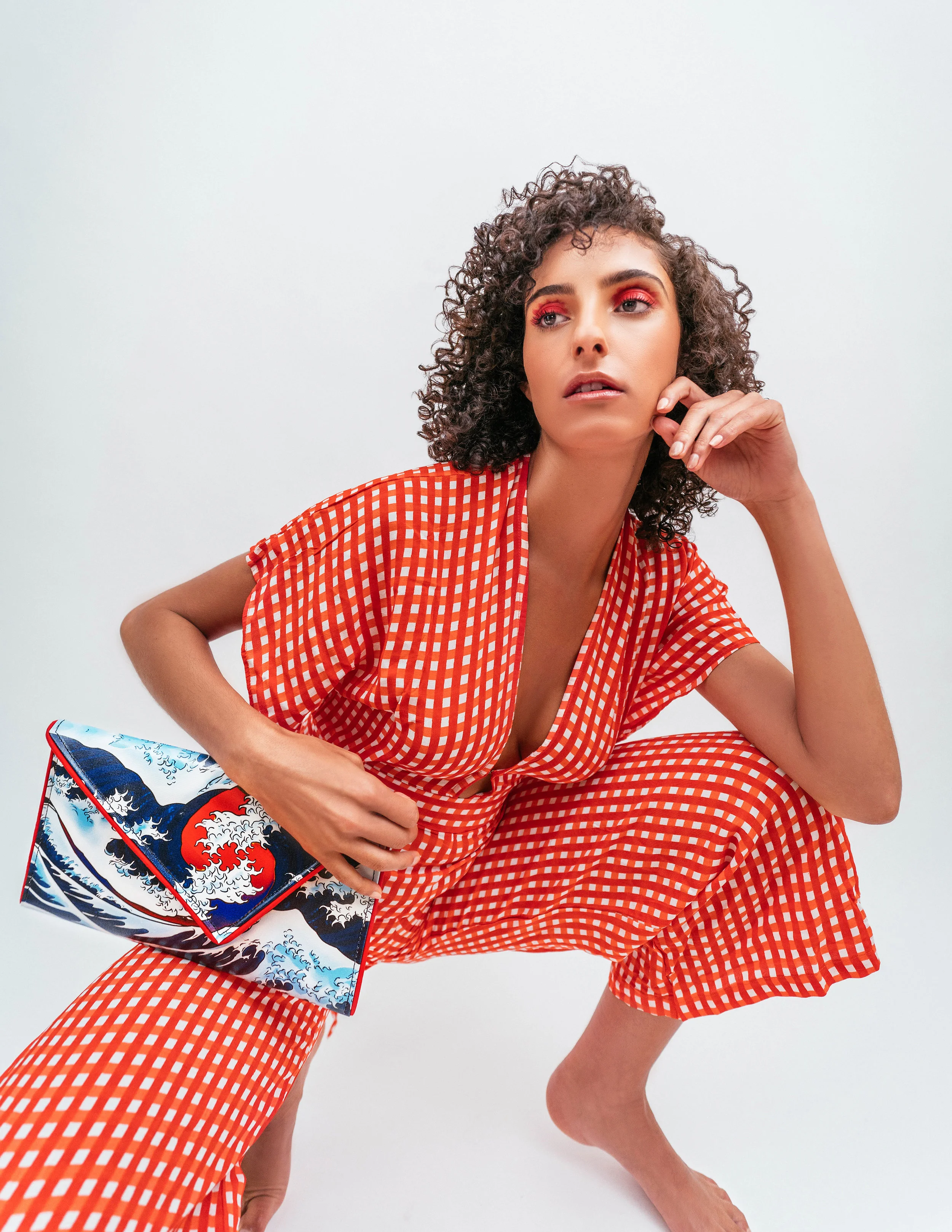 Jumpsuit: Zara, Handbag: Kent Stetson