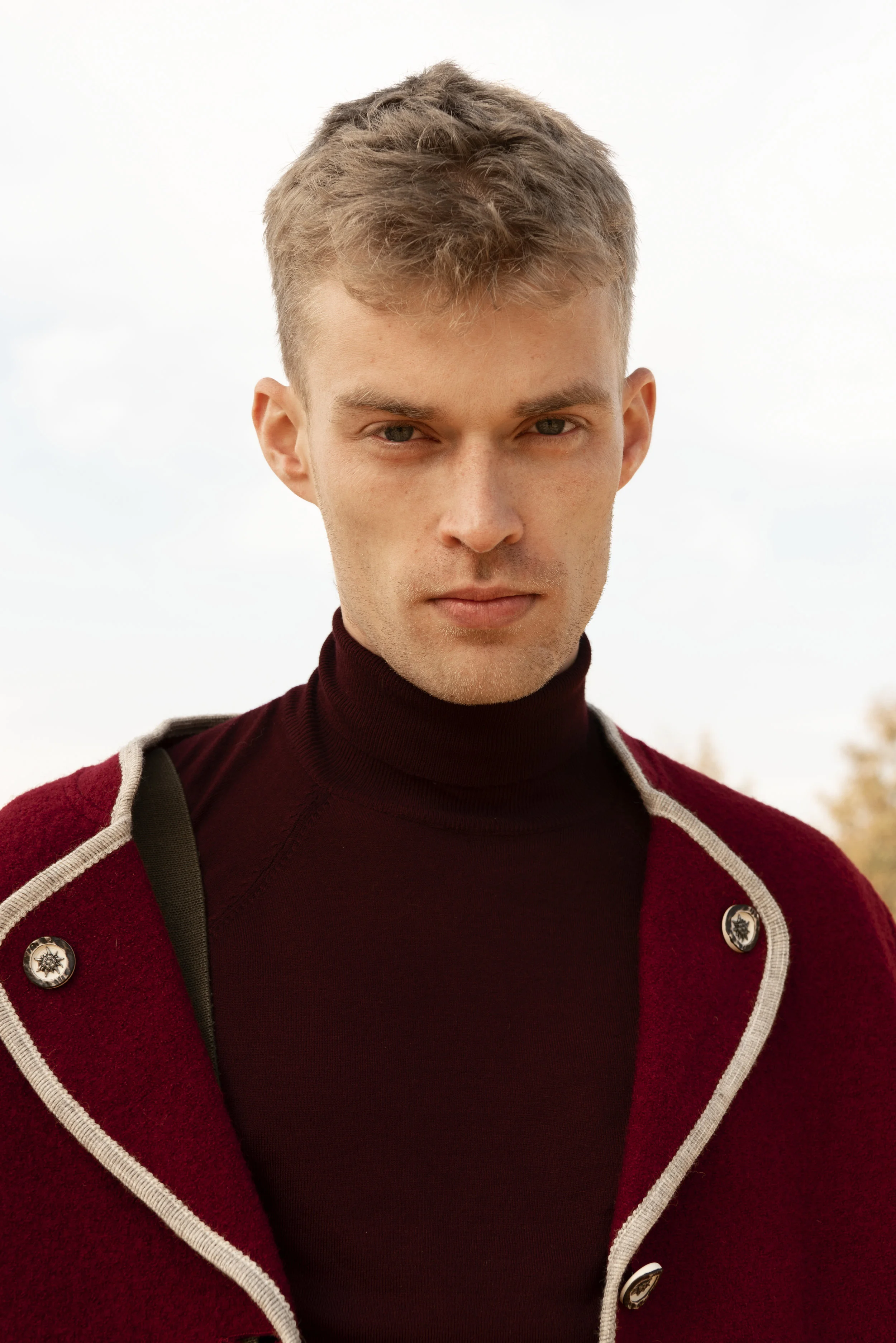 Turtle neck River suspenders and jacket stylist wardrobe.