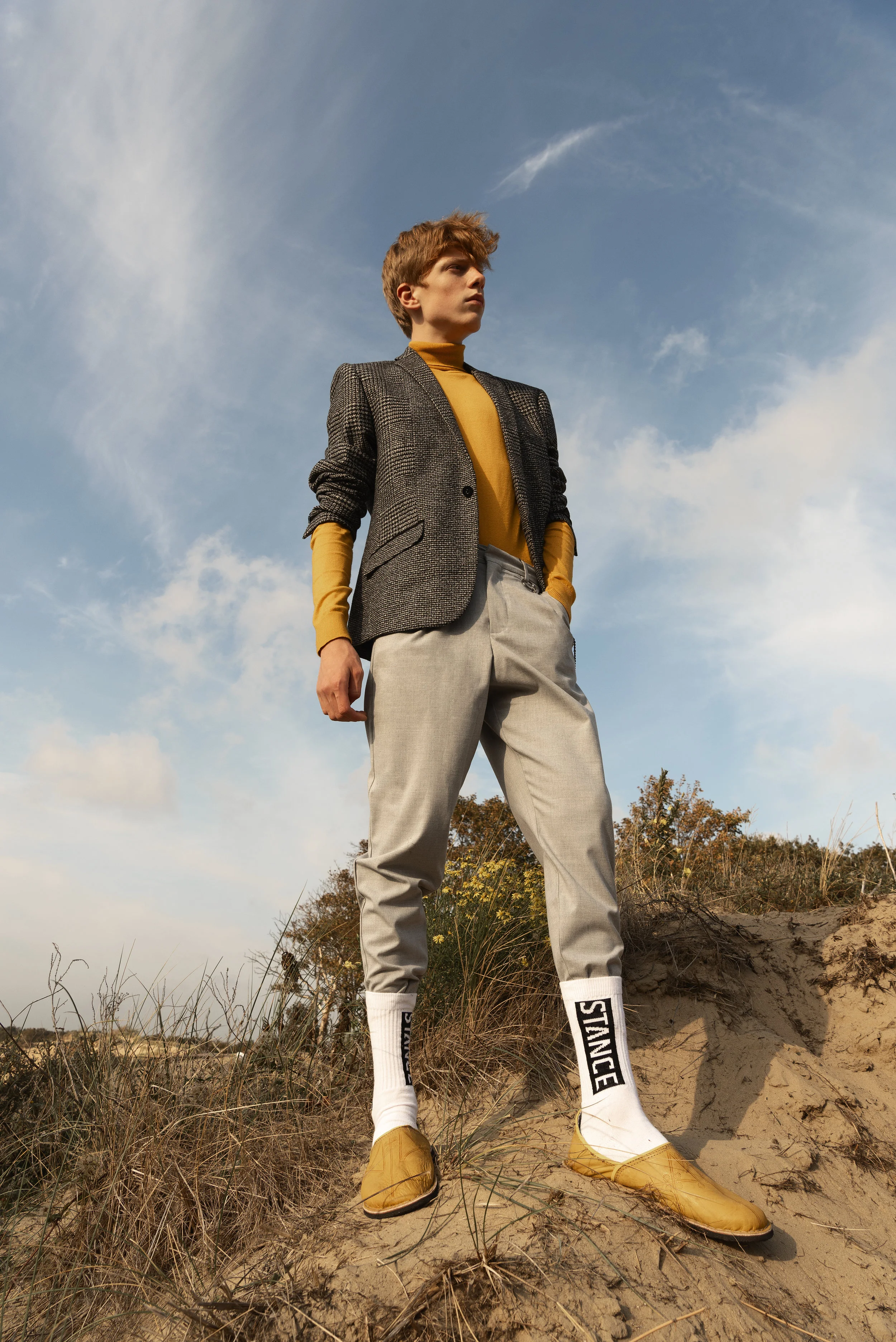 Turtle neck and jacket River Island, pants Pull and Bear, socks and shoes stylist wardrobe.