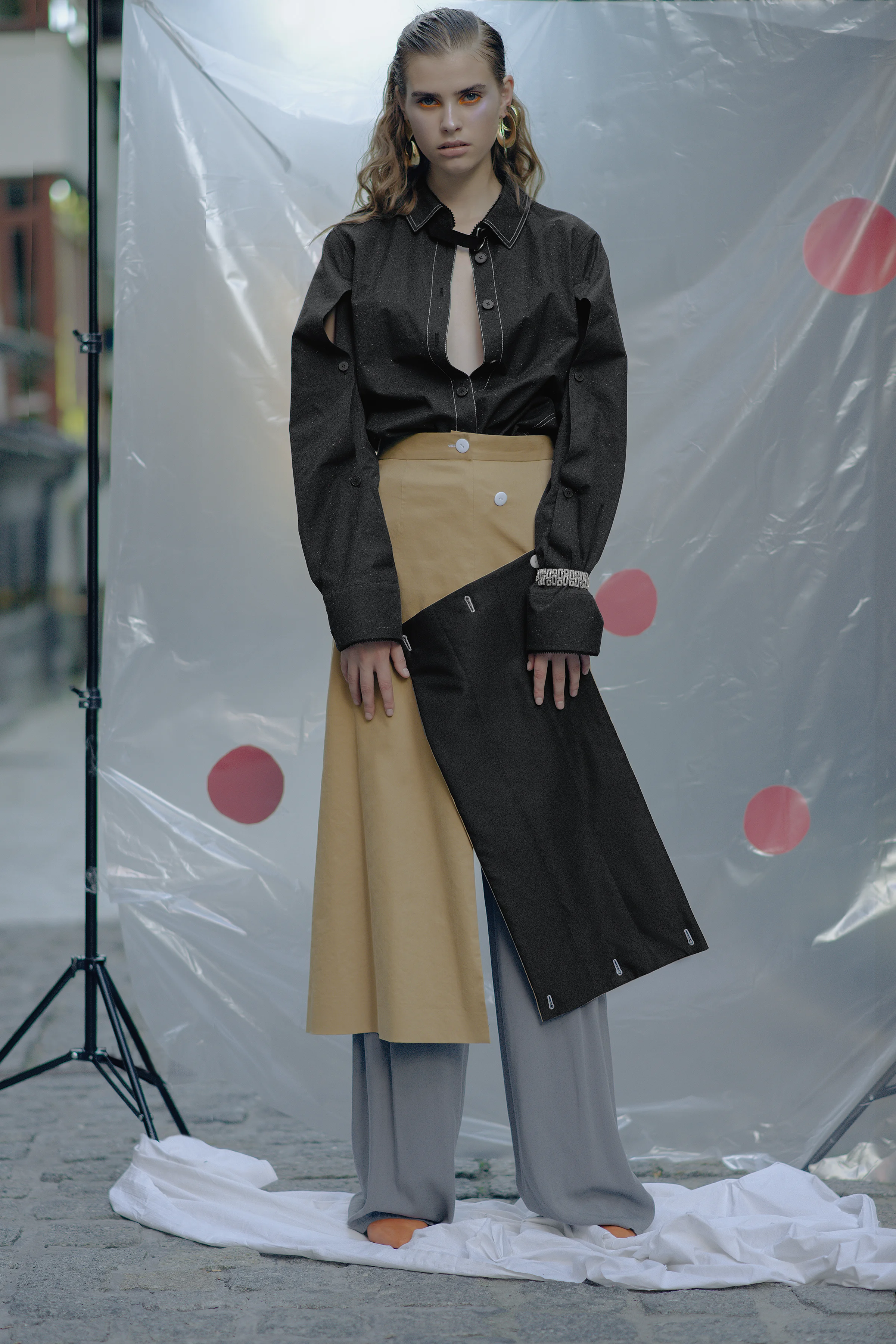 Parka PRZHONSKAYA Skirt CHAKSHYN Pants WHATEVER Bracelet Stylist’s own Earrings Stylist’s own Shoes PRZHONSKAYA & ALI SAULIDI