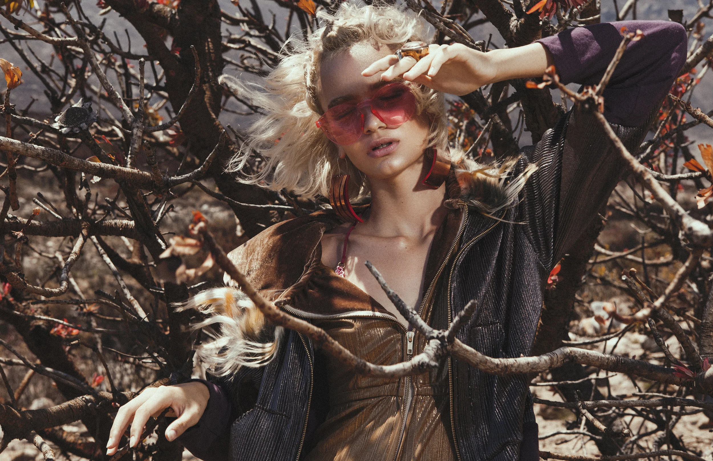 JUMPSUIT: Designer Dionne BOMBER JACKET: Designer Dionne SUNGLASSES: SKA EARRINGS: Philippa Green RINGS: Philippa Green