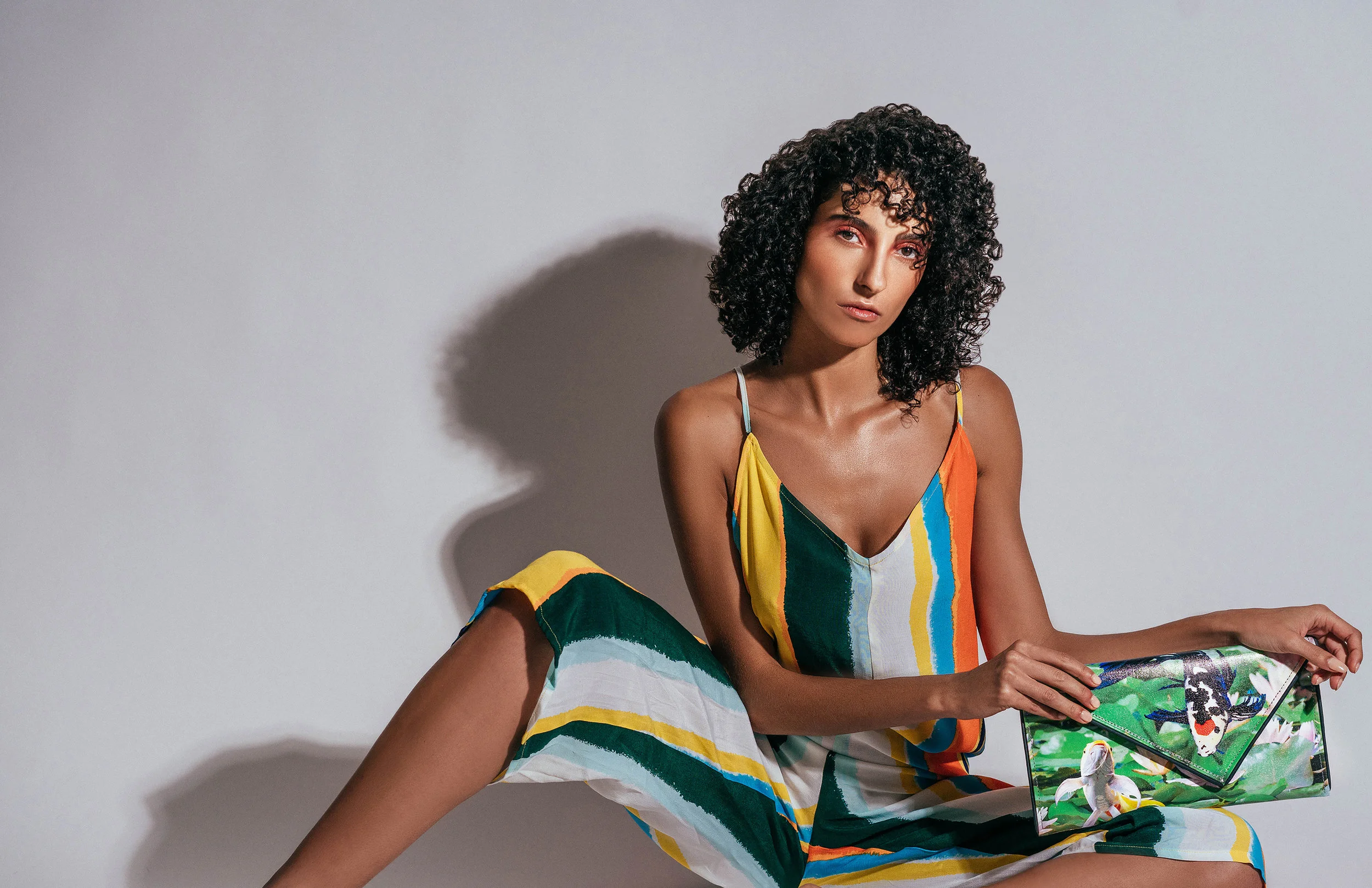Jumpsuit: Topshop, Handbag: Kent Stetson