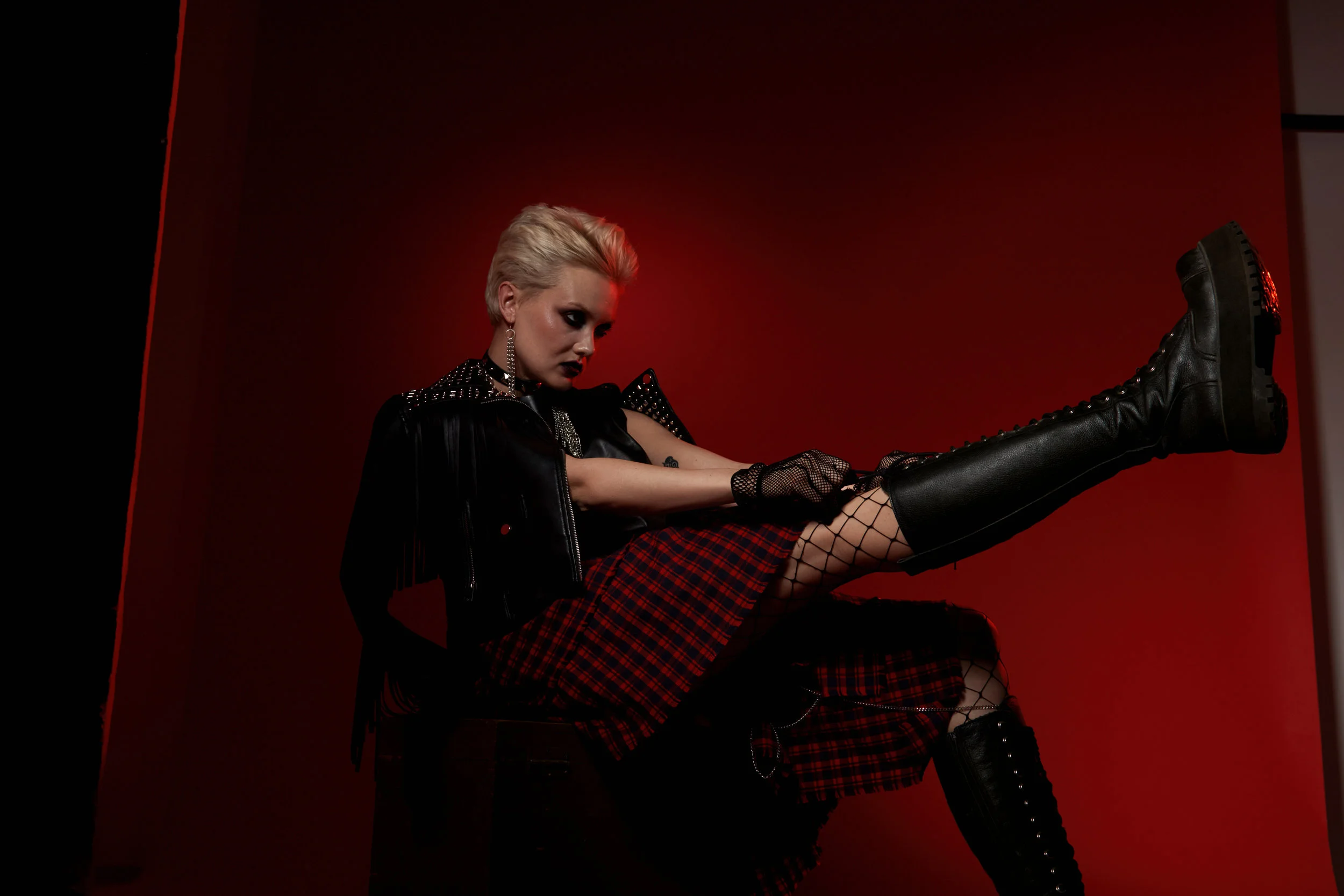 Leather jacket, plaid skirt - Nadezda Sizova Jacket, chains and shoes, boots, tights, mesh gloves - Stylist property