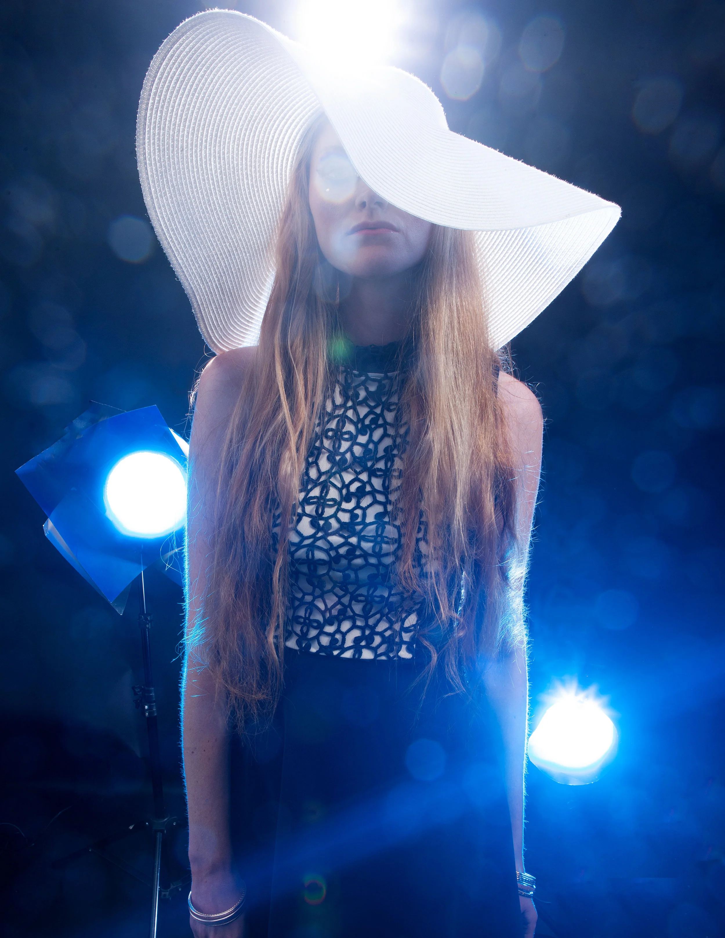 Hat: LAWLIET Dress: CLUB LONDON