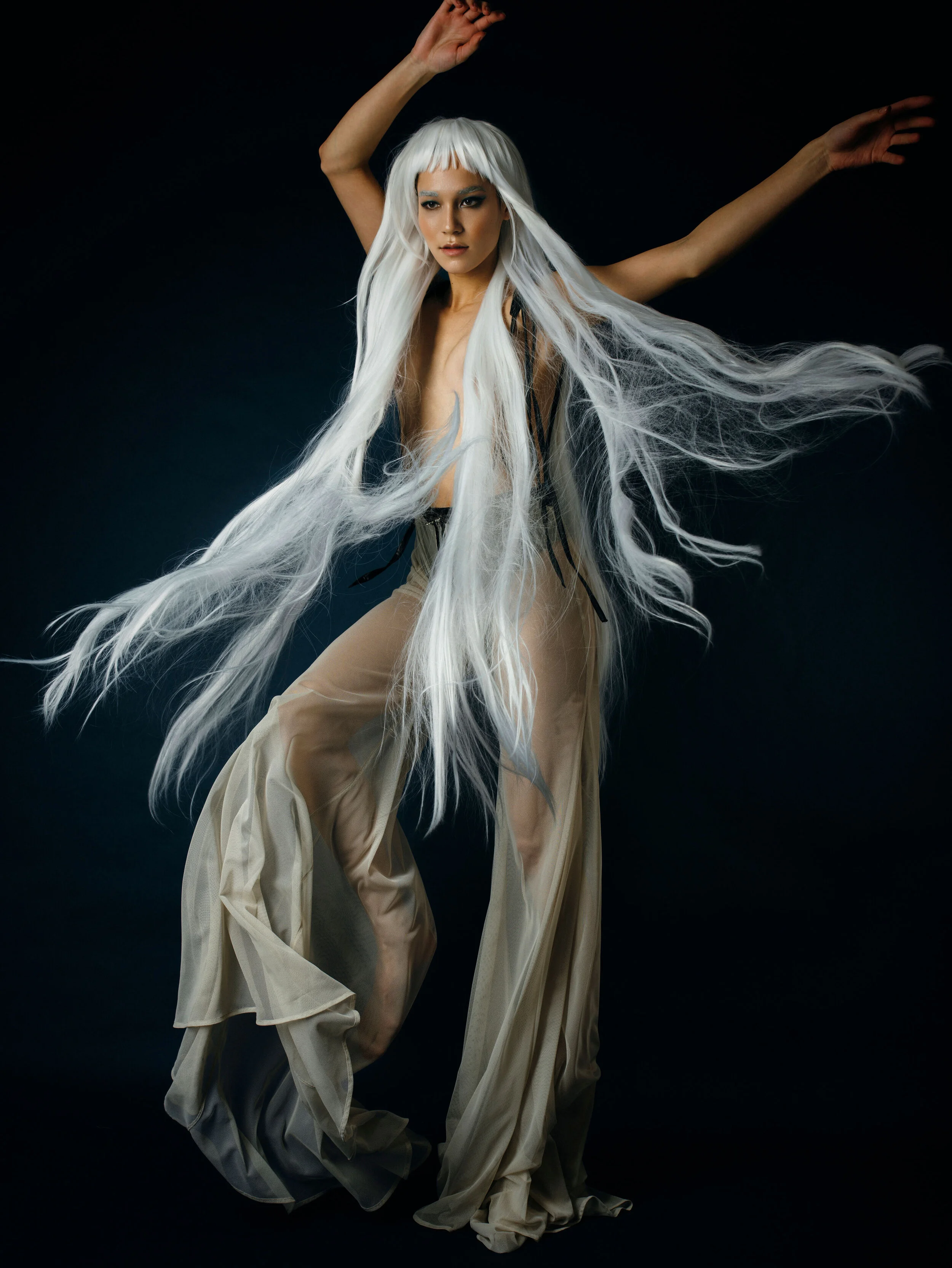 transparent flared pants with black braces