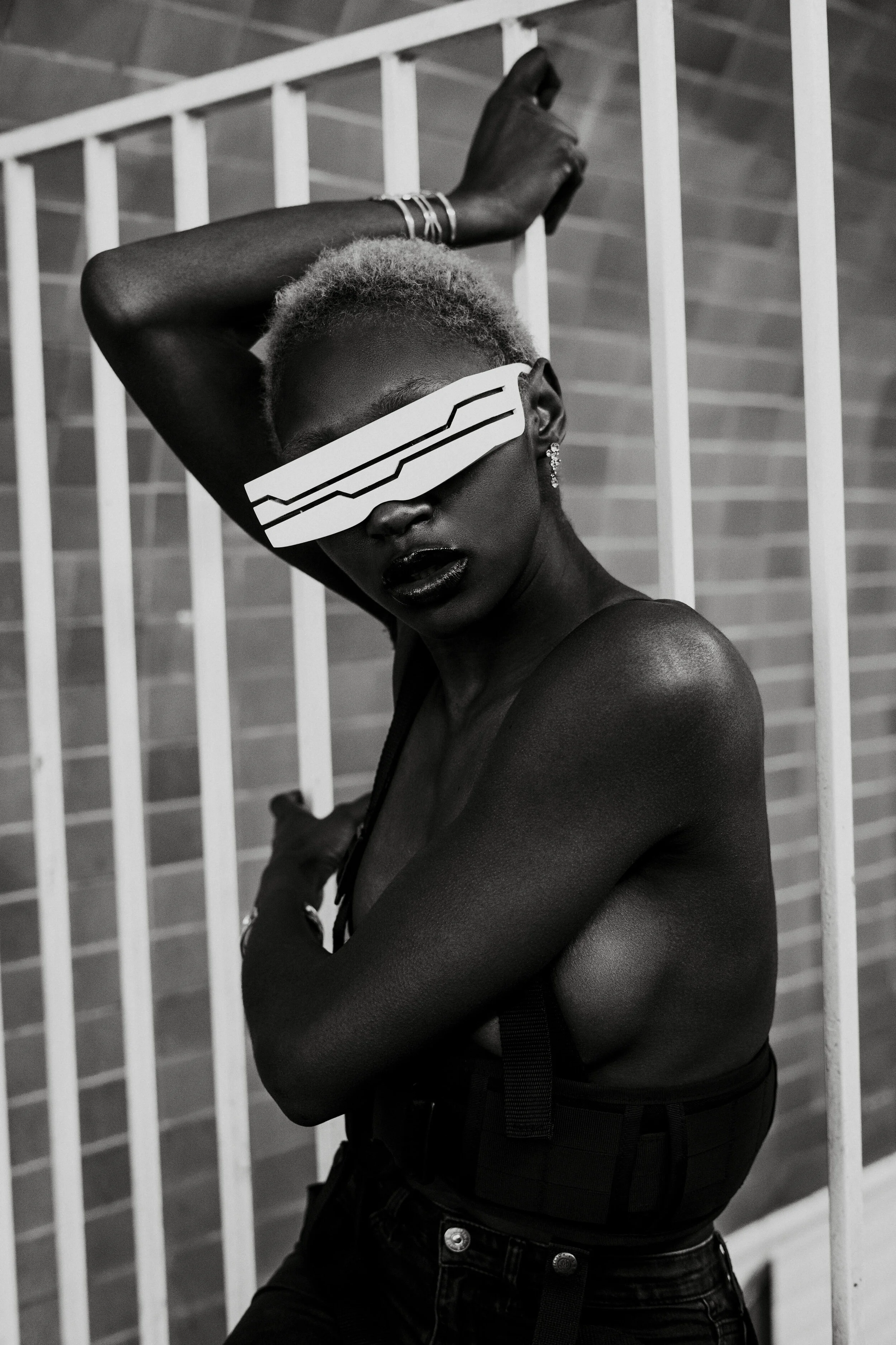 Photographer: Gaelle Andriantsarafara Female Model: Kiara Simmons Wardrobe Stylist: Stefnie K Photography Assistant: Lucie Monroe Fashion Designer: Marine Arnoul Wardrobe Credits: glasses, straps and belt , bracelets from martian agency Jea