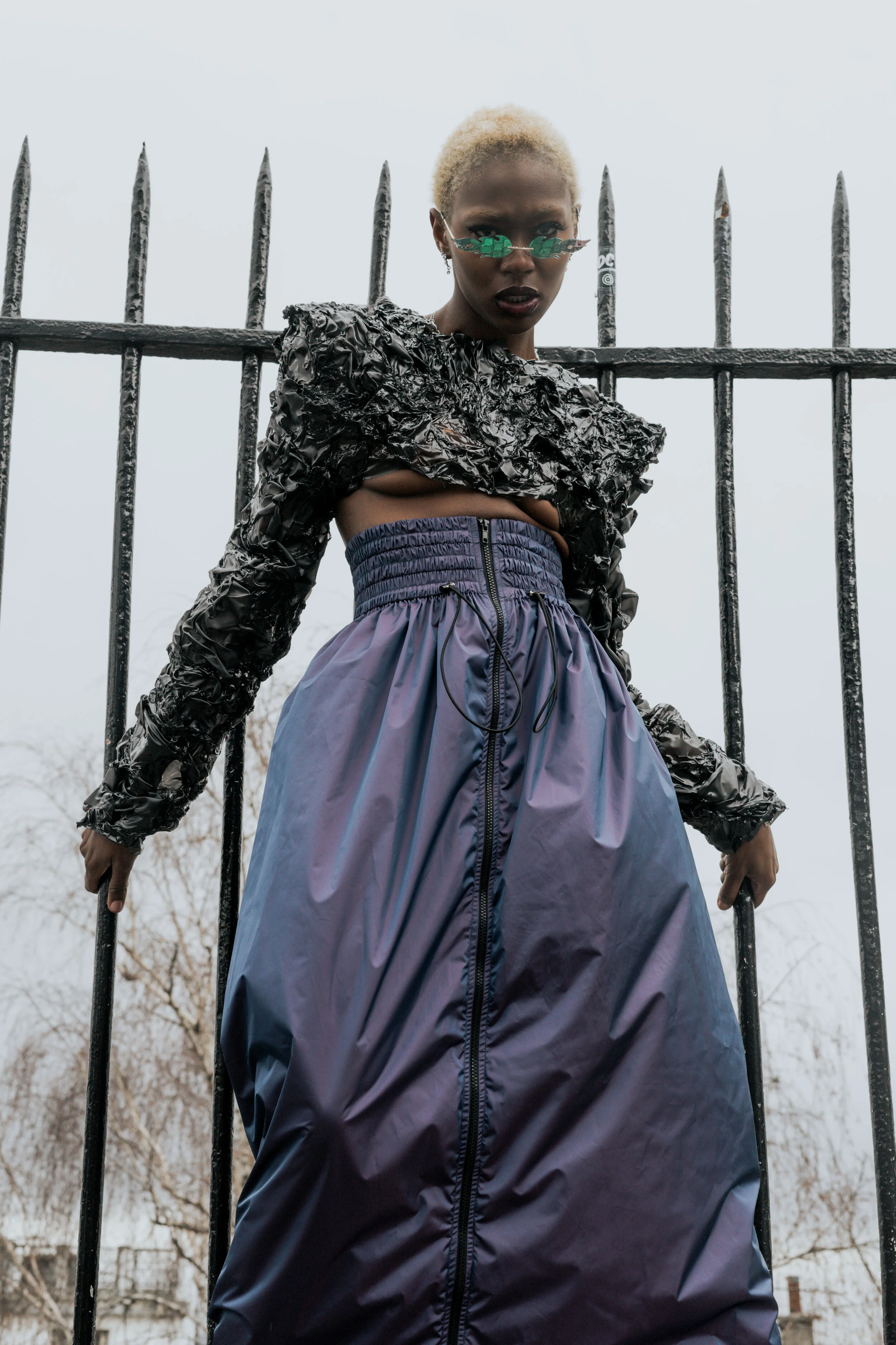 Photographer: Gaelle Andriantsarafara Female Model: Kiara Simmons Photography Assistant: Lucie Monroe Wardrobe Stylist: Stefnie K Fashion Designer: Marine Arnoul Wardrobe Credits: handmade top in upcycled heated PVC fabric , reflective purp
