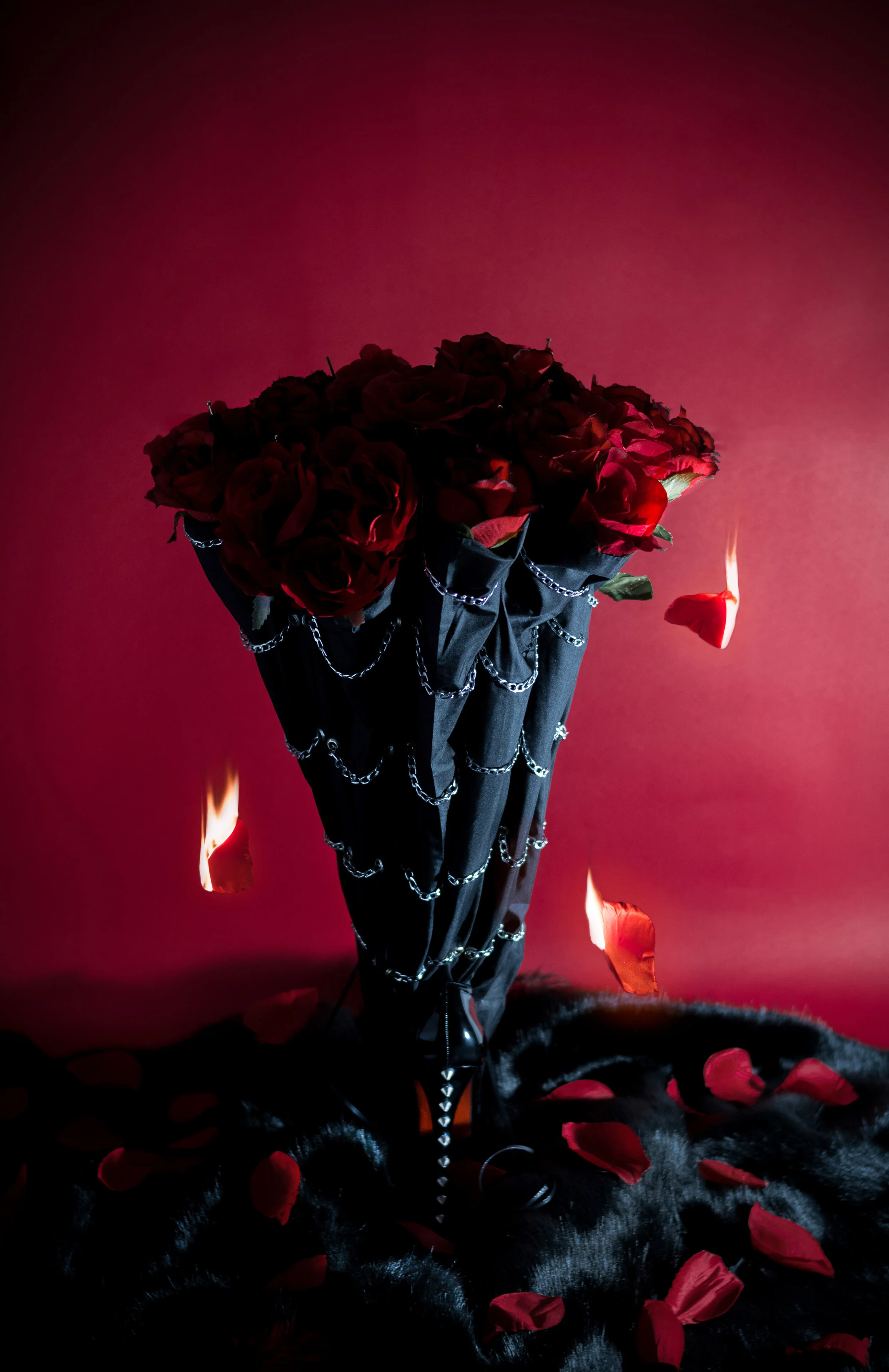 Photo Editor/Photographer: Paola Martín Sánchez - Cuesta Stylist/Creative Director/Accessory Designer: Víctor García García Wardrobe Credits: High boot made from a shoe and an umbrella decorated with chains. Design: Víctor García
