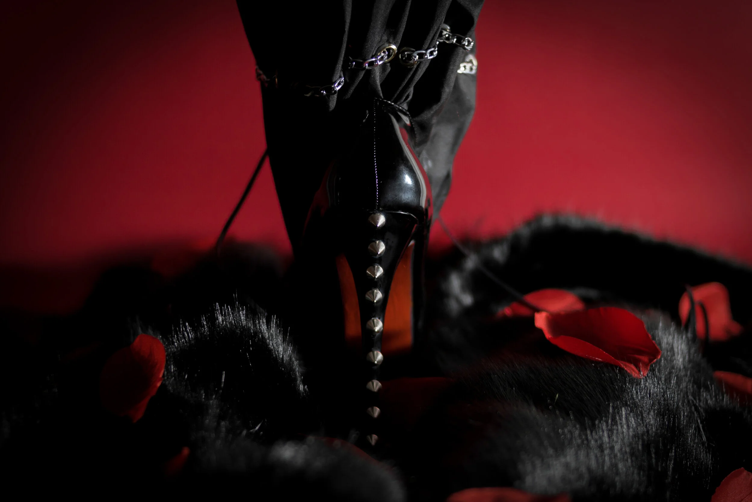 Photo Editor/Photographer: Paola Martín Sánchez - Cuesta Stylist/Creative Director/Accessory Designer: Víctor García García Wardrobe Credits: High boot made from a shoe and an umbrella decorated with chains. Design: Víctor García