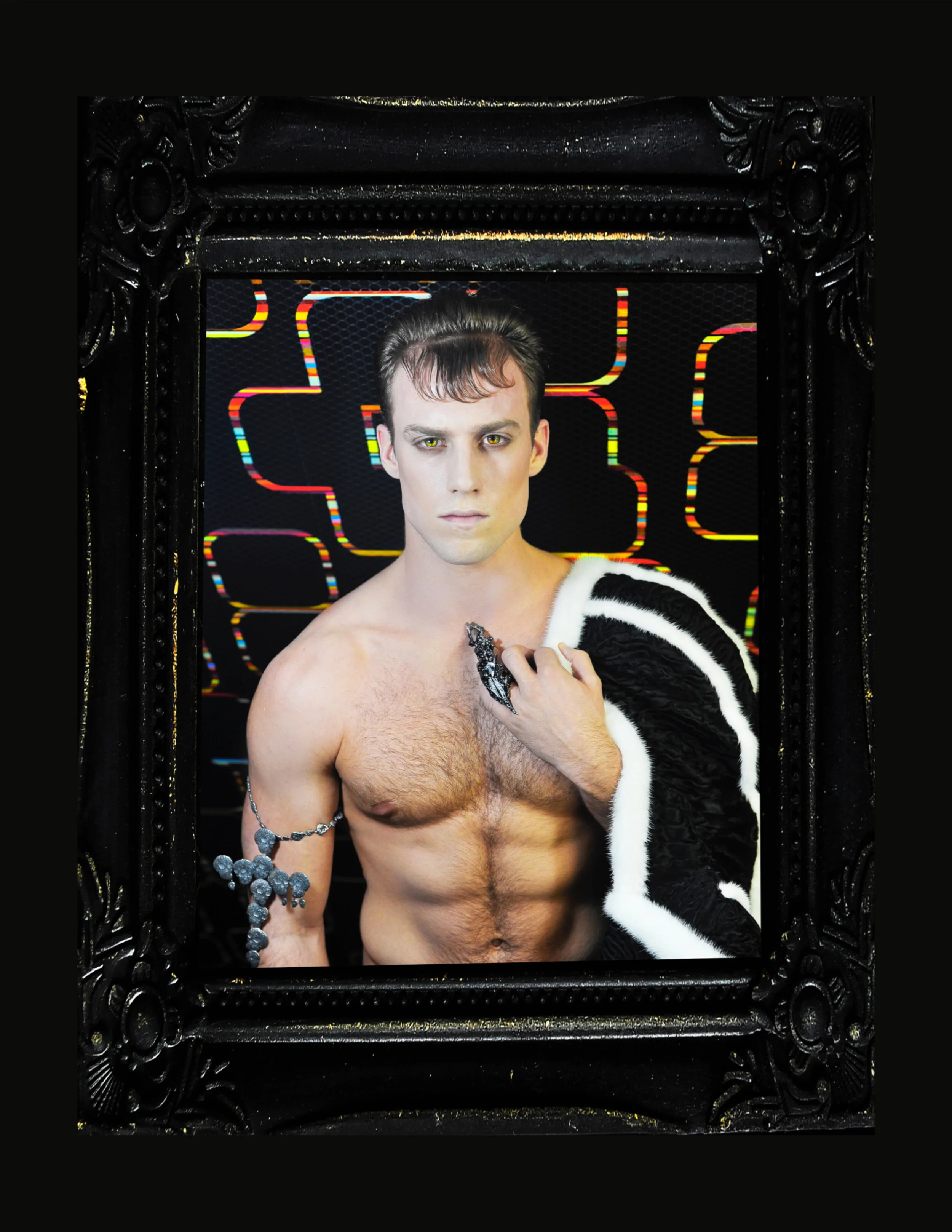 Creative Director: Sebastien Vienne Wardrobe Credits: Jacket and ring On Aura Tout Vu Jewerly cross Jean Boggio