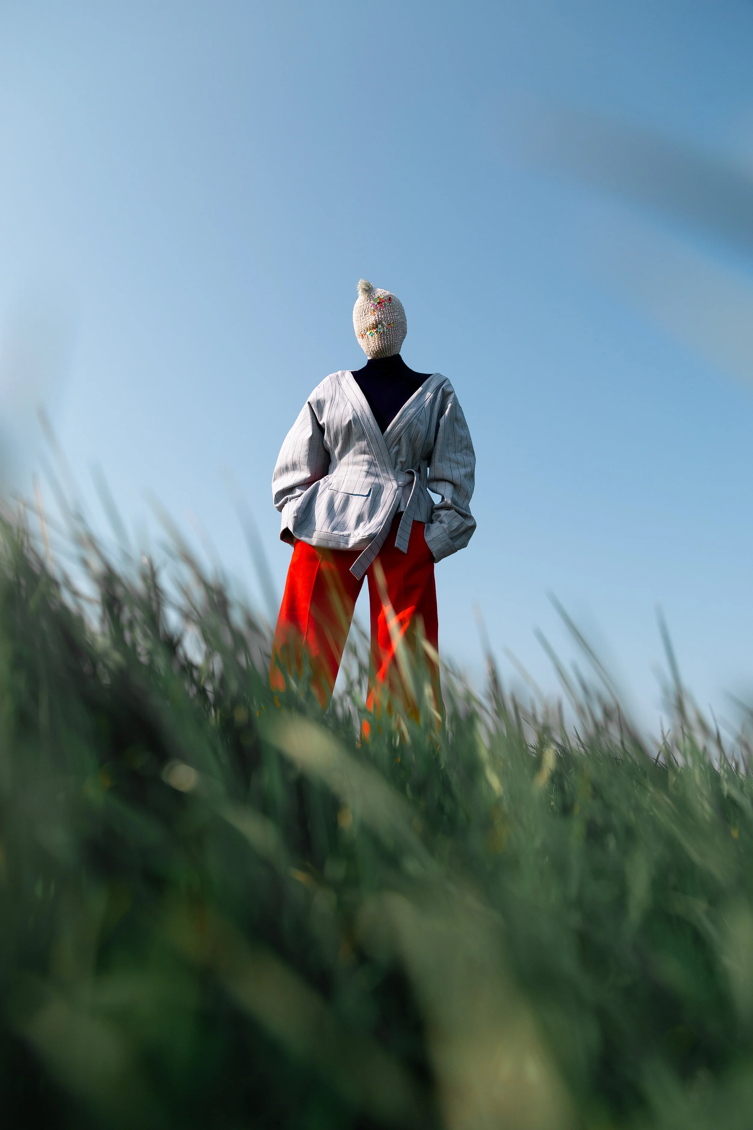 Photographer: Kevin Mora-Rosenkranz Male Model: Iain Arnott Wardrobe Stylist: Michelle Watson Fashion Designer: Morag Seaton Wardrobe Credits: Mask: Kitsch Me Vintage Jumper: Topshop Jacket: Morag Seaton Trousers: Morag Seaton