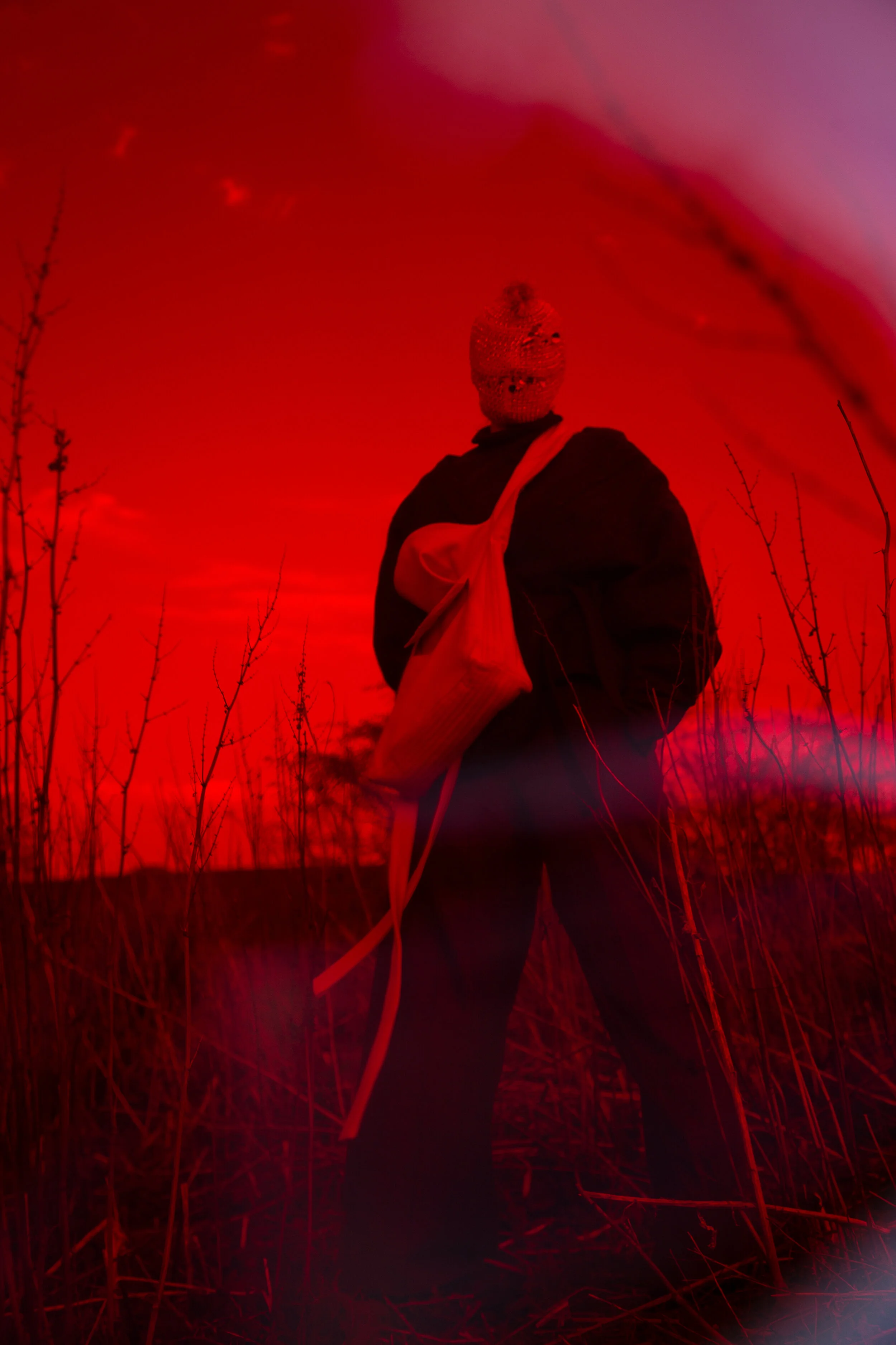 Photographer: Kevin Mora-Rosenkranz Male Model: Iain Arnott Wardrobe Stylist: Michelle Watson Fashion Designer: Morag Seaton Wardrobe Credits: Mask: Kitsch Me Vintage Bag: Morag Seaton Jacket: Morag Seaton Trousers: Morag Seaton