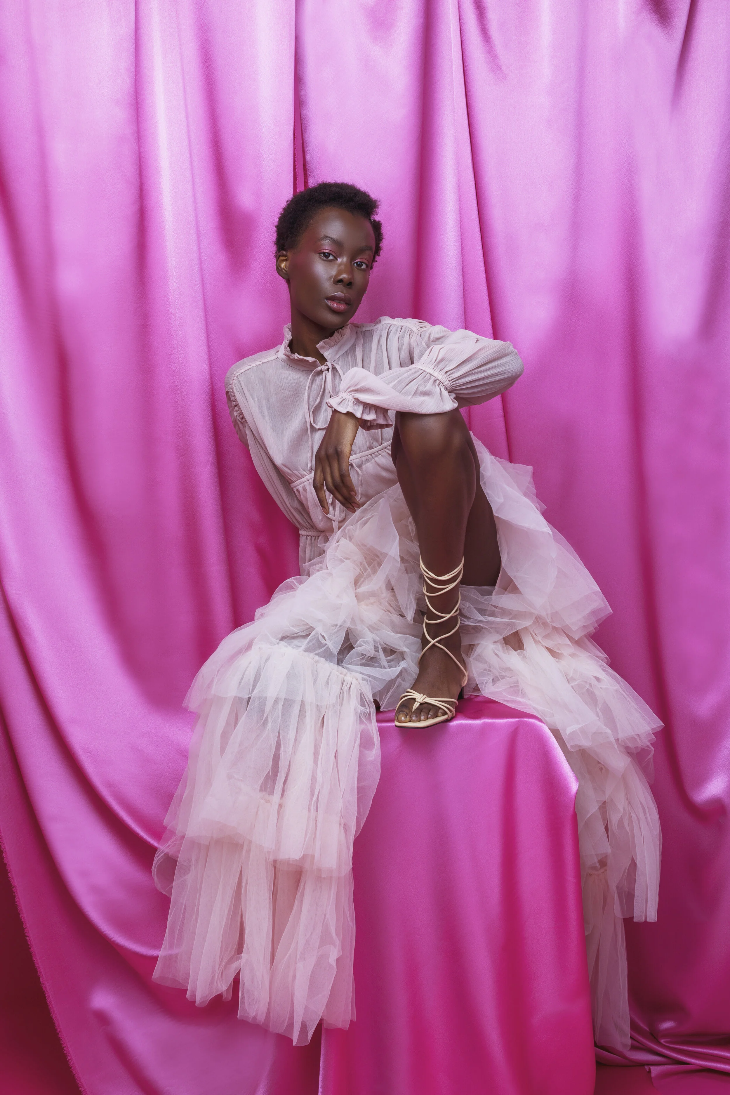 Photographer: Anastasia Oss Female Model: Biba Williams @PRM Model Agency Makeup Artist: Millie Gordon Wardrobe Stylist: Kelly Richardson Wardrobe Credits: Skirt, Kikiriki Top, NA_KD Strappy sandals, Z_Code_Z