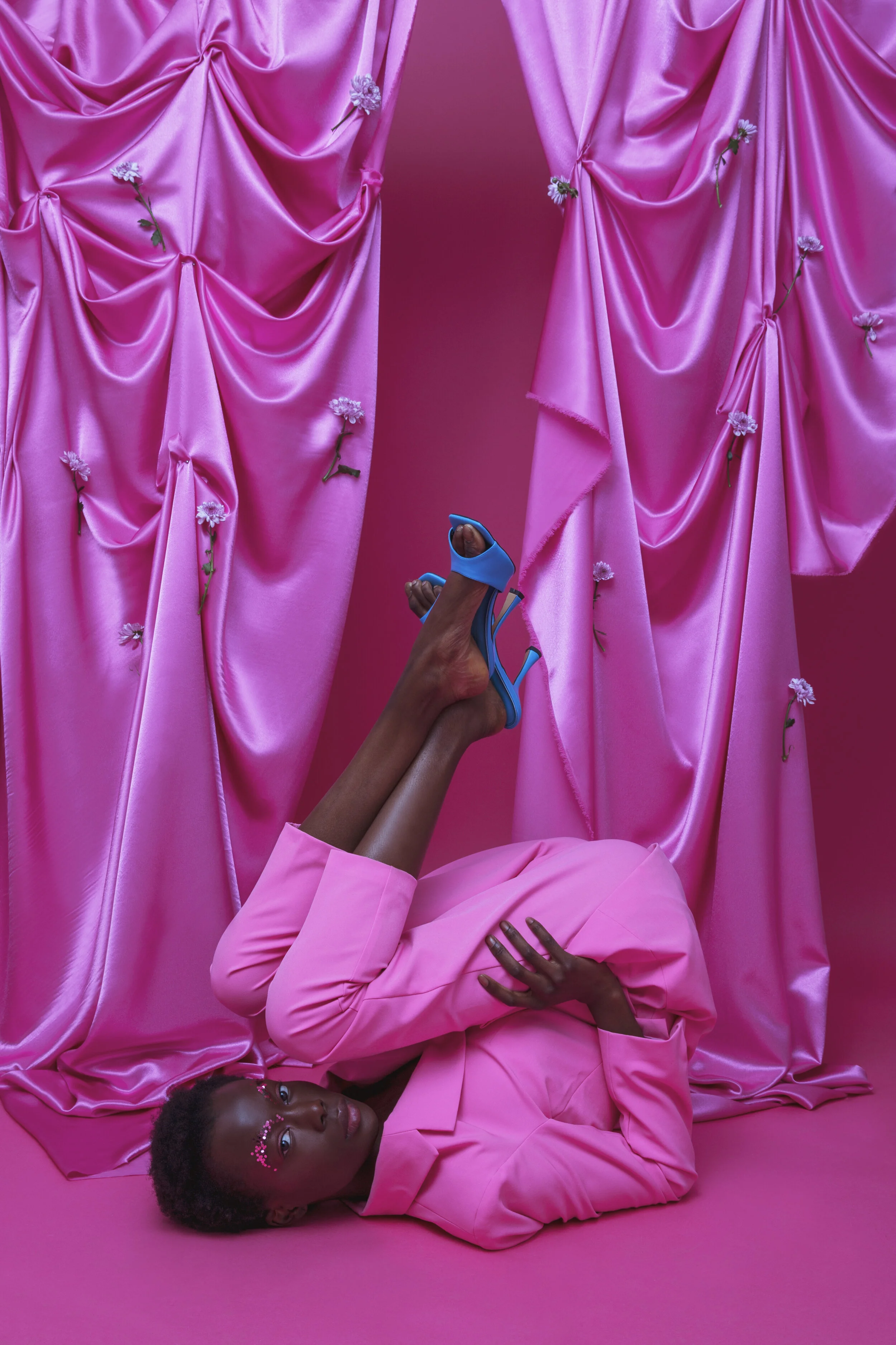 Photographer: Anastasia Oss Female Model: Biba Williams @PRM Model Agency Makeup Artist: Millie Gordon Wardrobe Stylist: Kelly Richardson Wardrobe Credits: Suit, ASOS Shoes, ASOS
