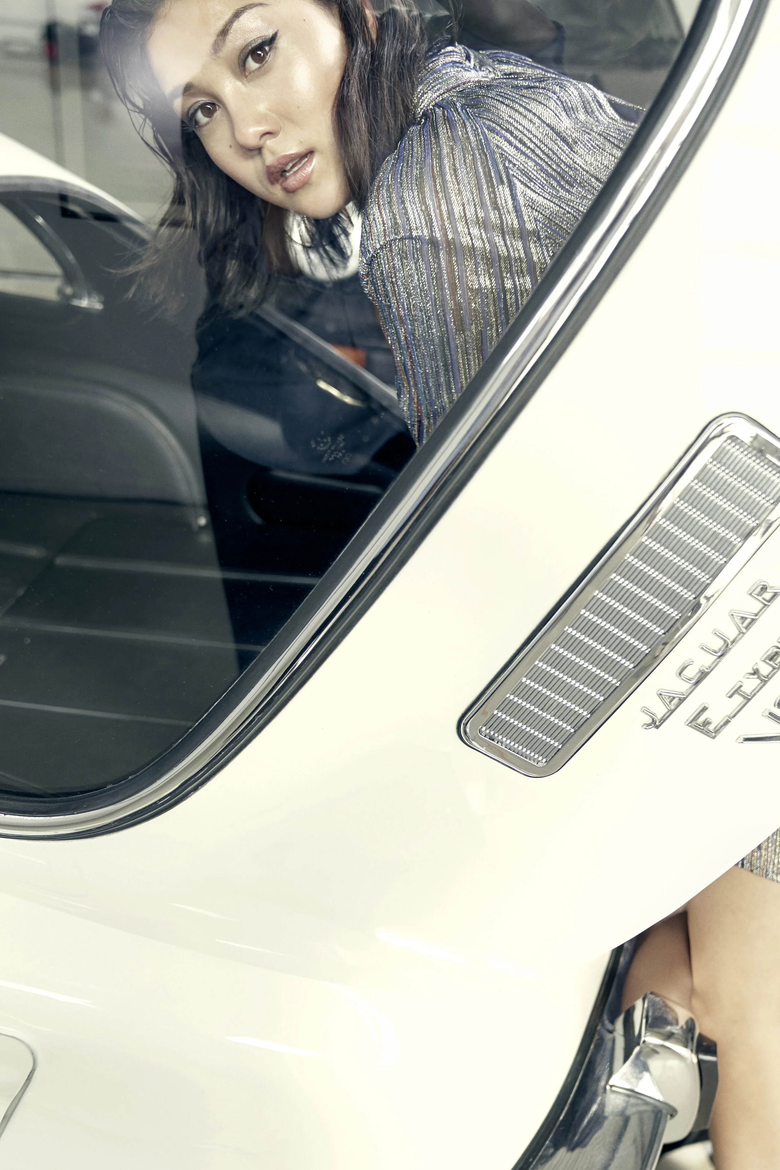 Photographer: Andrea Kadler Model: Muriel Dang @Promod Model Agency Makeup Artist: Ulla Kornelius Wardrobe Stylist: Andrea Light Assistant: Gertje Koenig Wardrobe Credits: Lurex Dress by ALICE & OLIVIA Car JAGUAR E TYPE 12