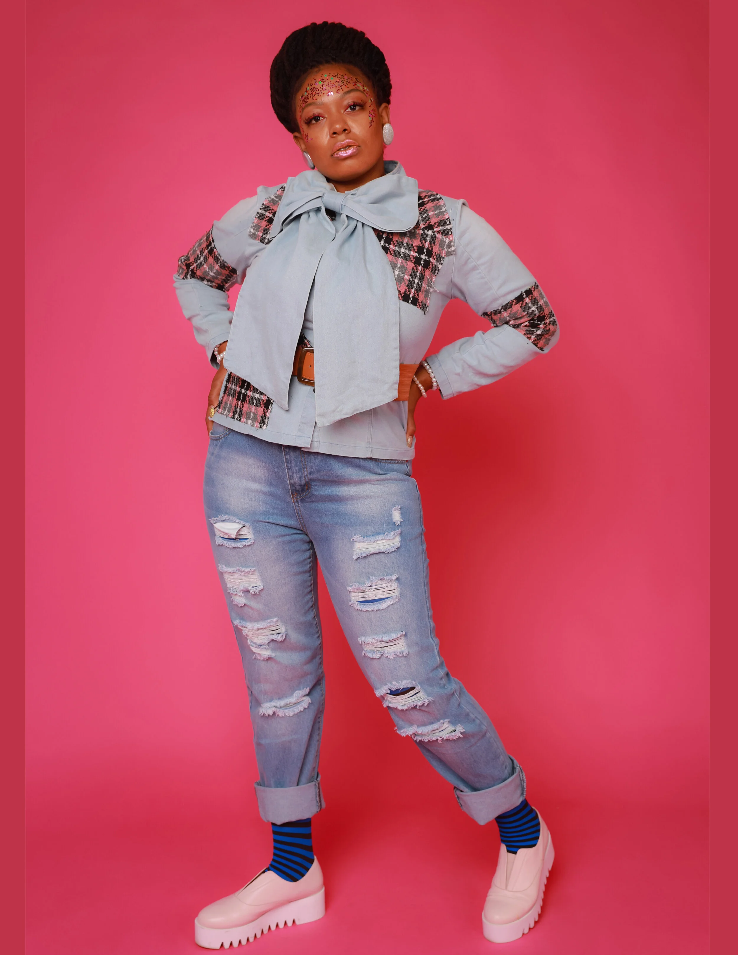 Fashion Designer: Justin Haynes www.Jus10h.org Photographer: Louie Moreno Female Model: Shanice Ibrahim Makeup Artist: Sassy Frass Hair Stylist: Karen Griffin Creative Director: Andrew Maxwell Accessory Designer: Saige's Muse Wardrobe Credits