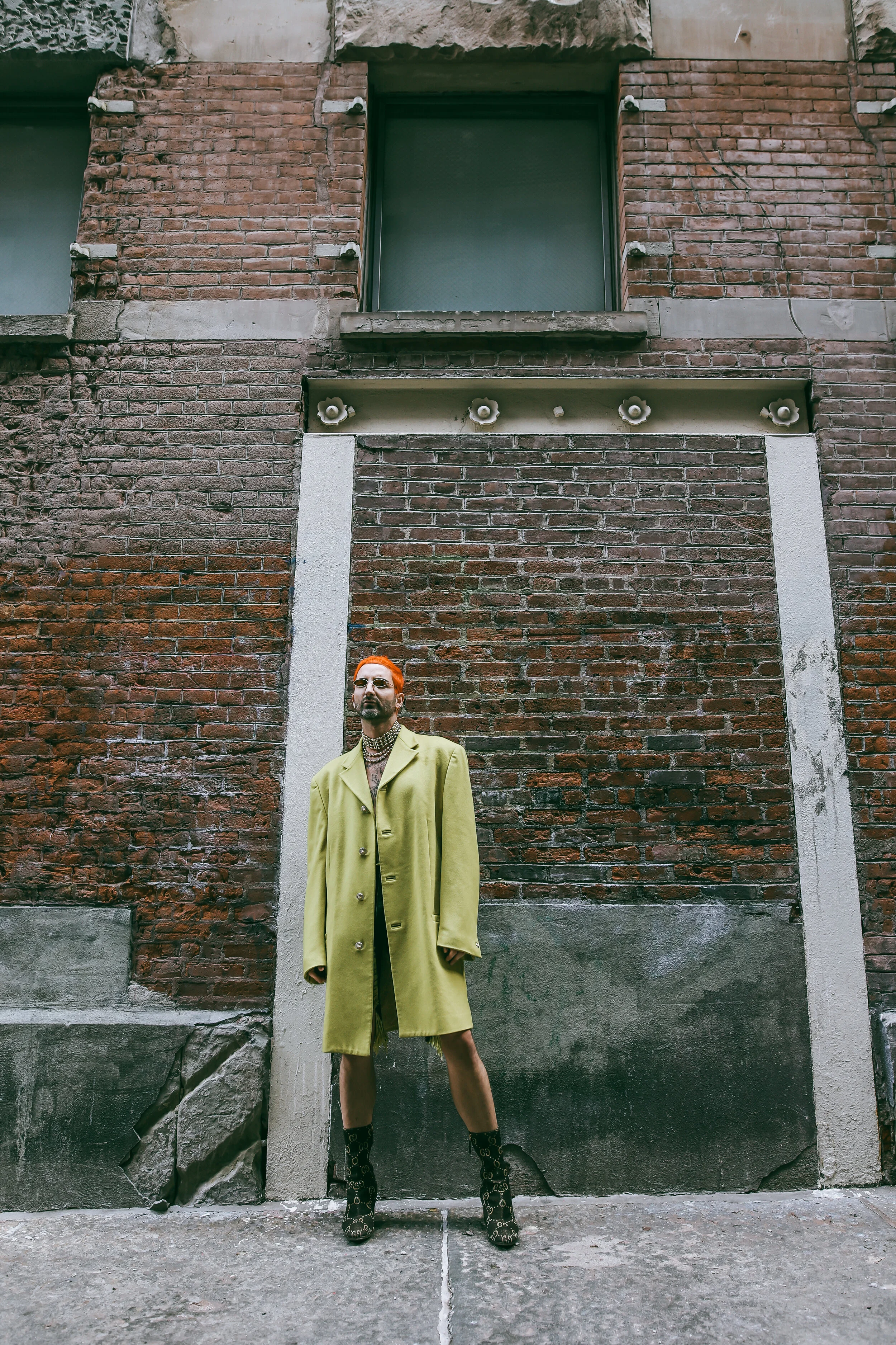 Photographer: Tatiana Katkova Wardrobe Stylist/Creative Director/Model/Makeup Artist/Hair Stylist: Andi Ospina Wardrobe Credits: Hair by: @michaelmorenohair Necklace by: @versace Jacket by: @versace Shorts by: @marques_almeida Boots