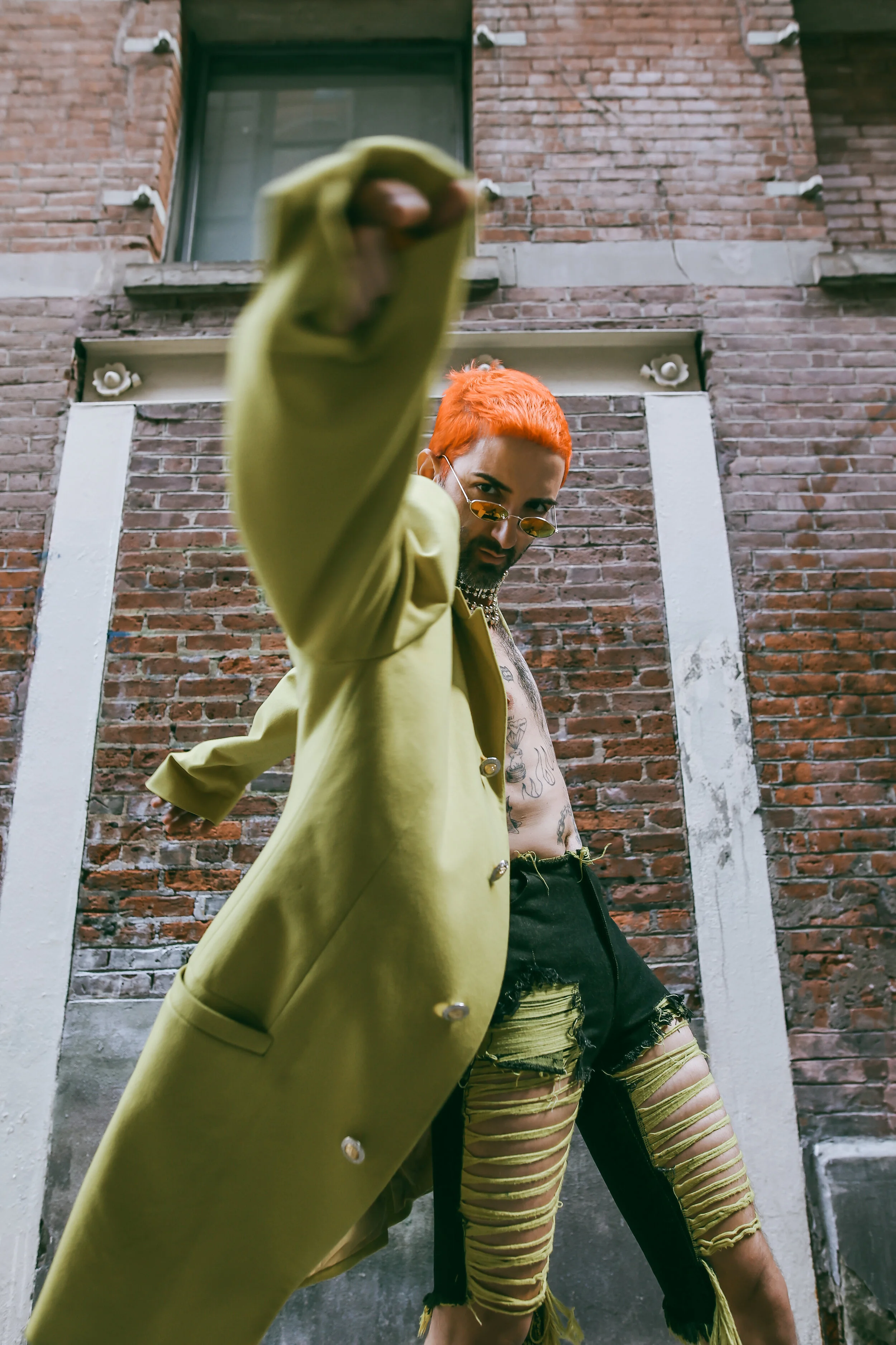 Photographer: Tatiana Katkova Wardrobe Stylist/Creative Director/Model/Makeup Artist/Hair Stylist: Andi Ospina Wardrobe Credits: Hair by: @michaelmorenohair Necklace by: @versace Jacket by: @versace Shorts by: @marques_almeida Boots