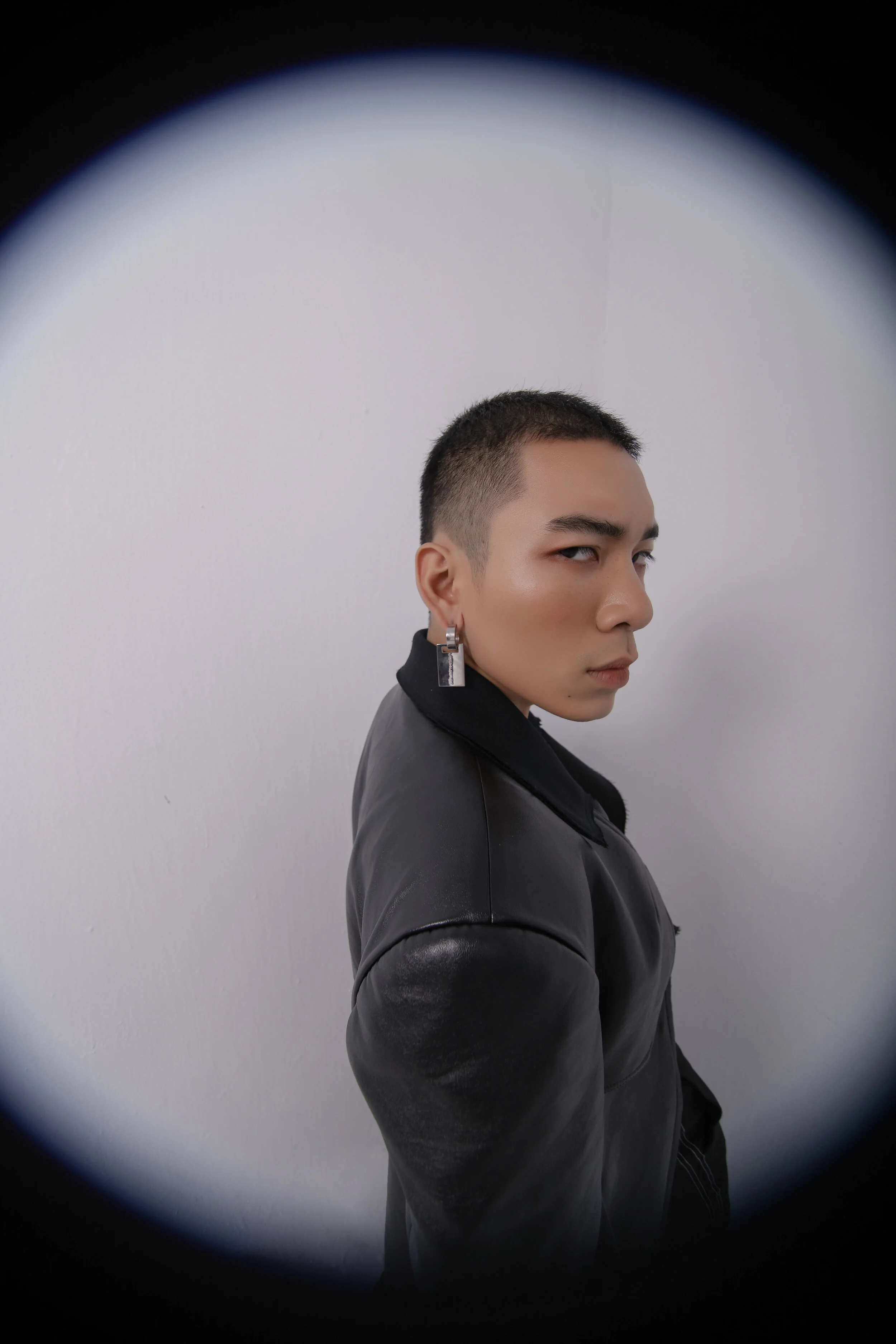 Photographer: Nguyen Du Creative Director: Kelbin Lei Male Model: Hung Anh Makeup Artist: Xi Quan Le Wardrobe Credits: Hung Anh wears Leather Coat: Le Hoang Anh Khoa Accessories: Emili Jewelry