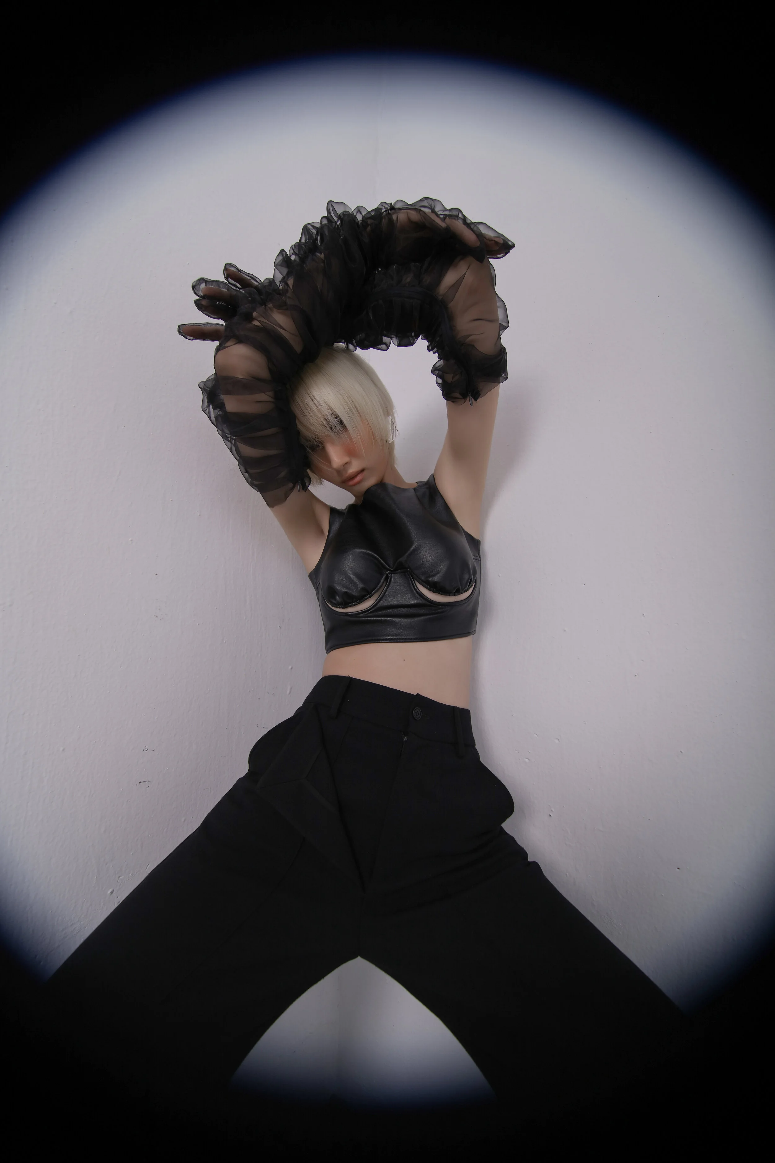 Photographer: Nguyen Du Creative Director: Kelbin Lei Female Model: Hang Nguyen Makeup Artist: Xi Quan Le Creative Director: Kelbin Lei Wardrobe Credits: Hang Nguyen wears Hat: Minh Phu x Bao Son Top: Klei Studio Trousers: Klei Studio