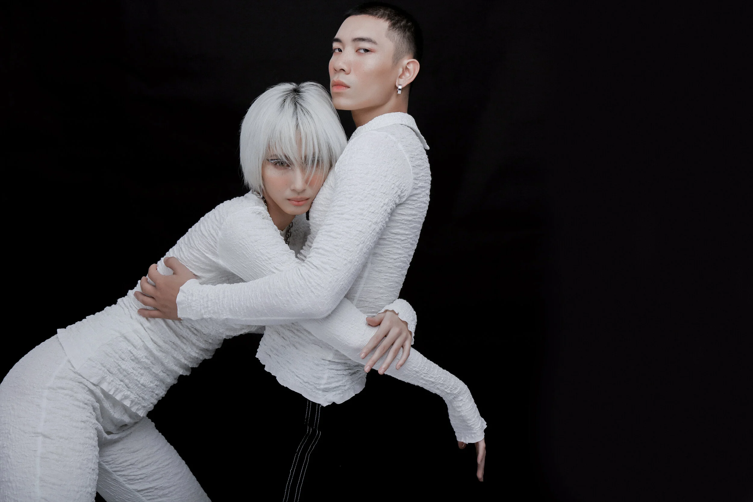 Creative Director: Kelbin Lei Wardrobe Credits: Female and male models wear Top: Klei Studio Trousers: Klei Studio