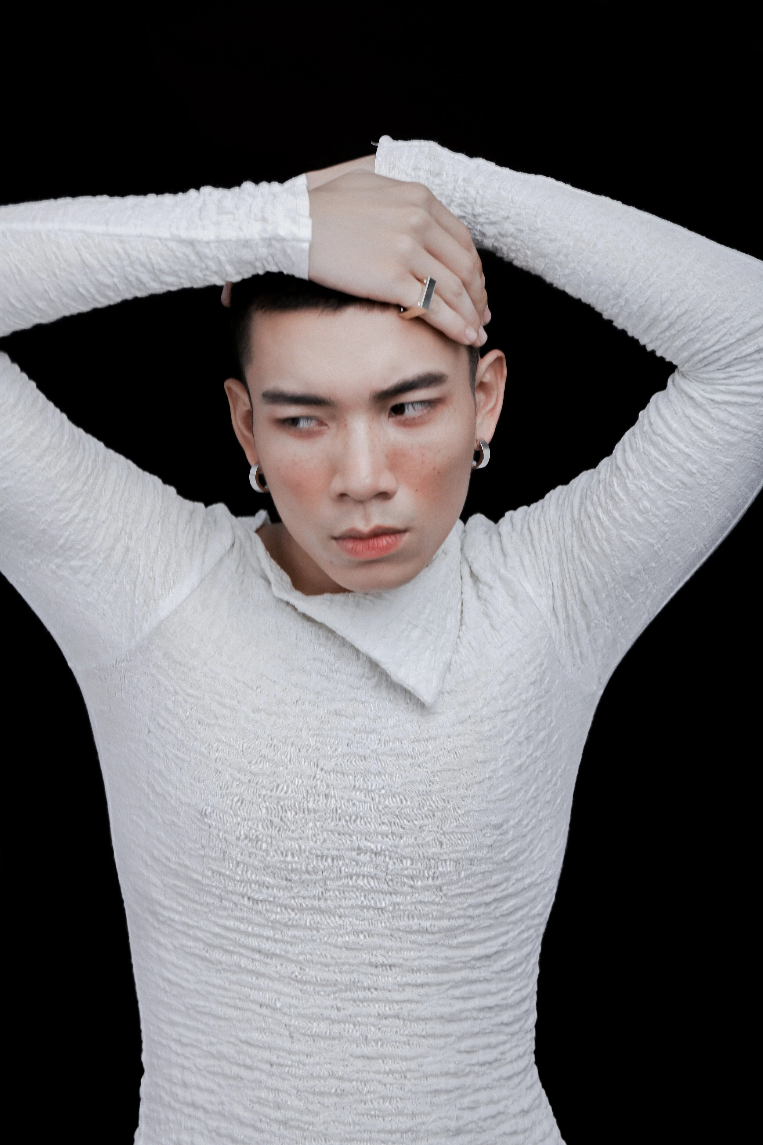 Creative Director: Kelbin Lei Makeup Artist: Xi Quan Le Creative Director: Kelbin Lei Wardrobe Credits: Male models wears Top: Klei Studio Accessories: Emili Jewelry