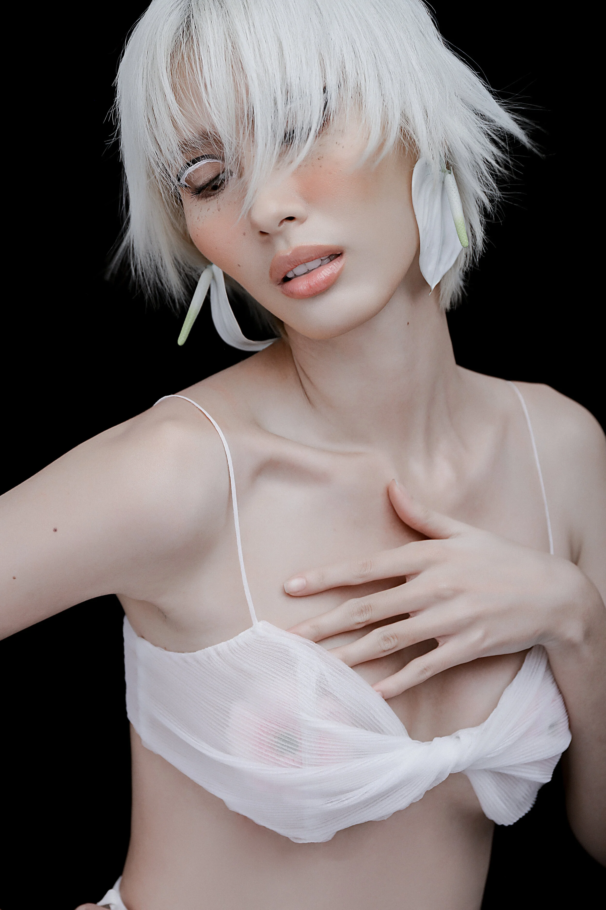 Female Model: Hang Nguyen Crop top: Minh Phu x Bao Son Accessories prepared by Makeup Artist - Xi Quan Le