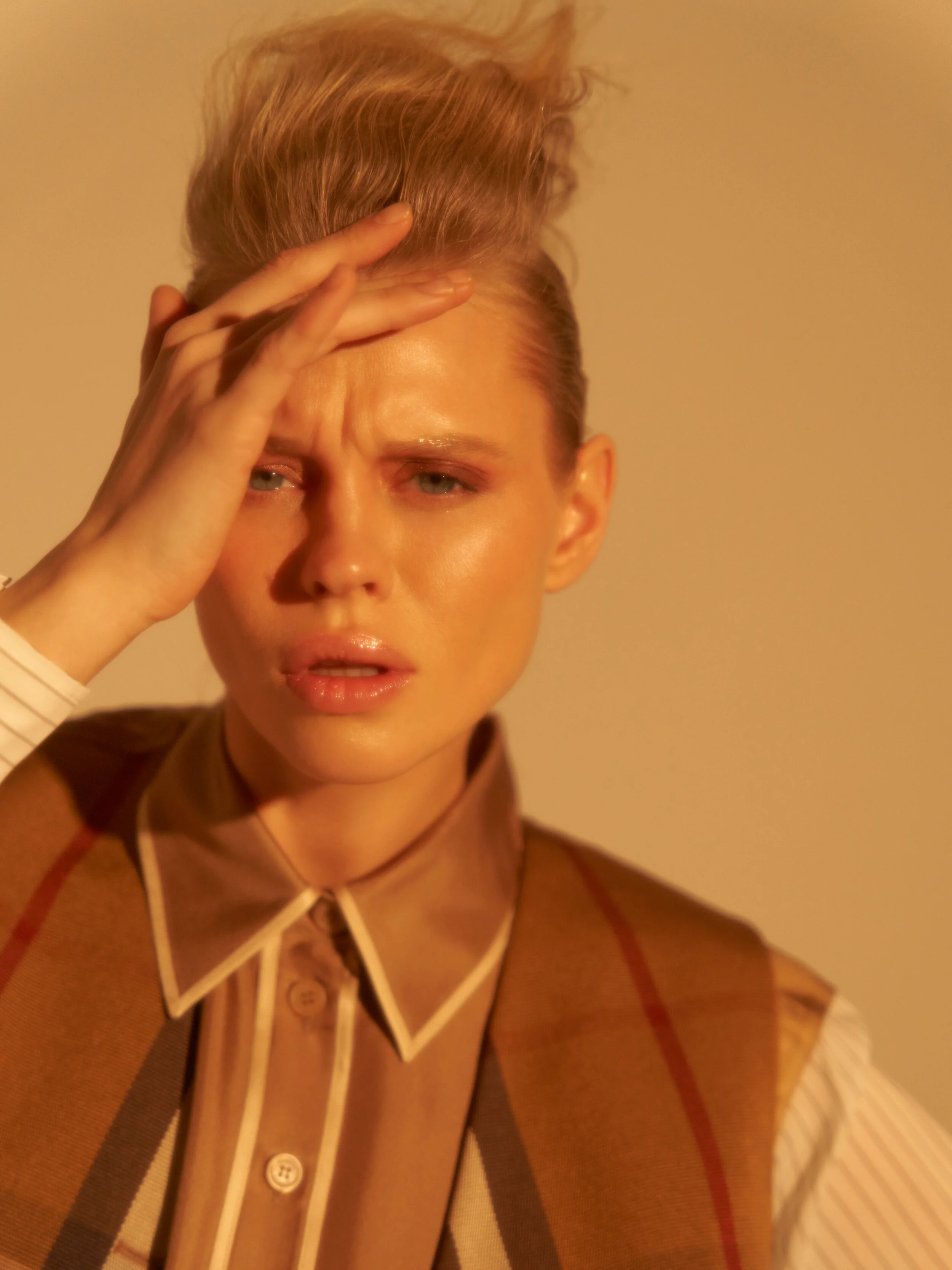 Photographer: Tomjuskevicius Female Model: Laura Aleks Makeup Artist: Rusne Gabriele Donaityte Hair Stylist: Anželika Wojc Stylist: Violeta Krasovska Wardrobe Credits: Burberry shirt Burberry vest Max Mara pants Bottega Veneta high