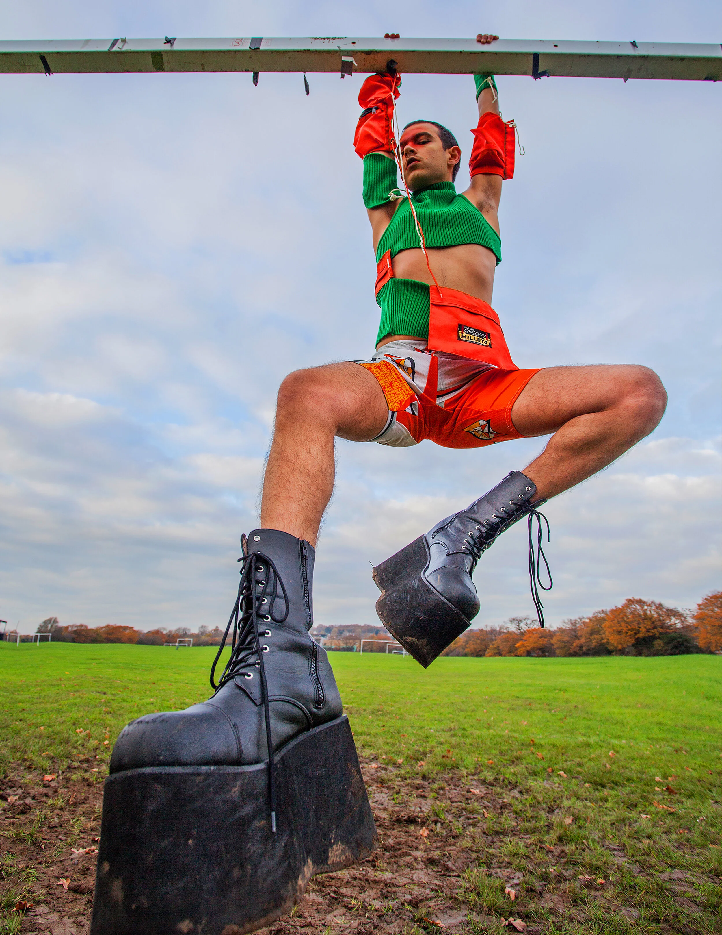 Photographer: Amelia Sonsino Male Model: Sorin Varga Makeup Artist: Stefan Zamfor Art Director: Luena Paulino Wardrobe Stylist: Tudor Covaciu Wardrobe Credits: Top and Shorts by CONGREGATIONdesign Boots by Funtasma