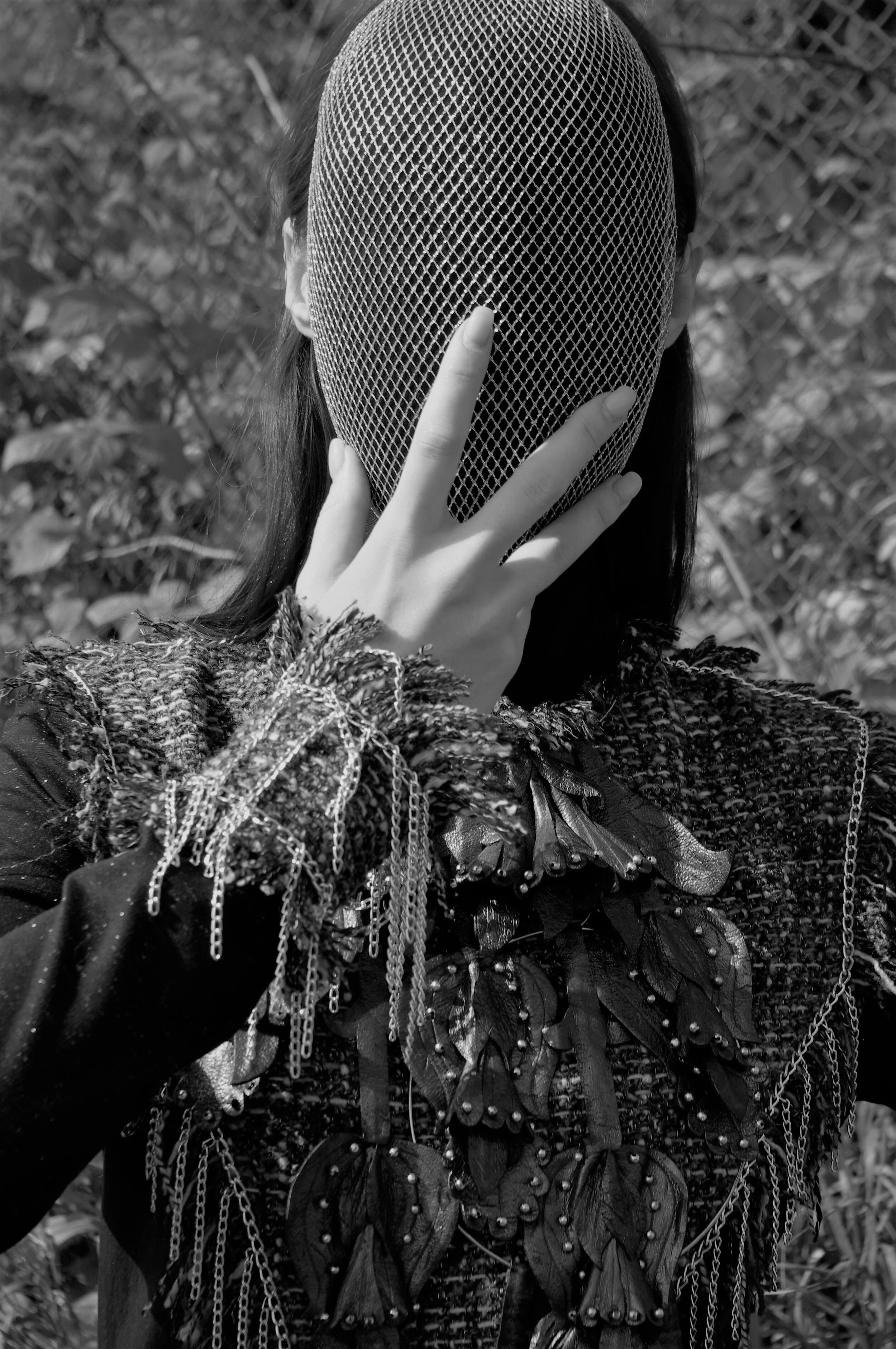 Photographer: Marina Uralskaya Fashion Designer: Marina Uralskaya Model: Valentina Gorbacheva Wardrobe Credits: Silver mask , leather necklace, tweed and jersey bodysuit by Marina Uralskaya