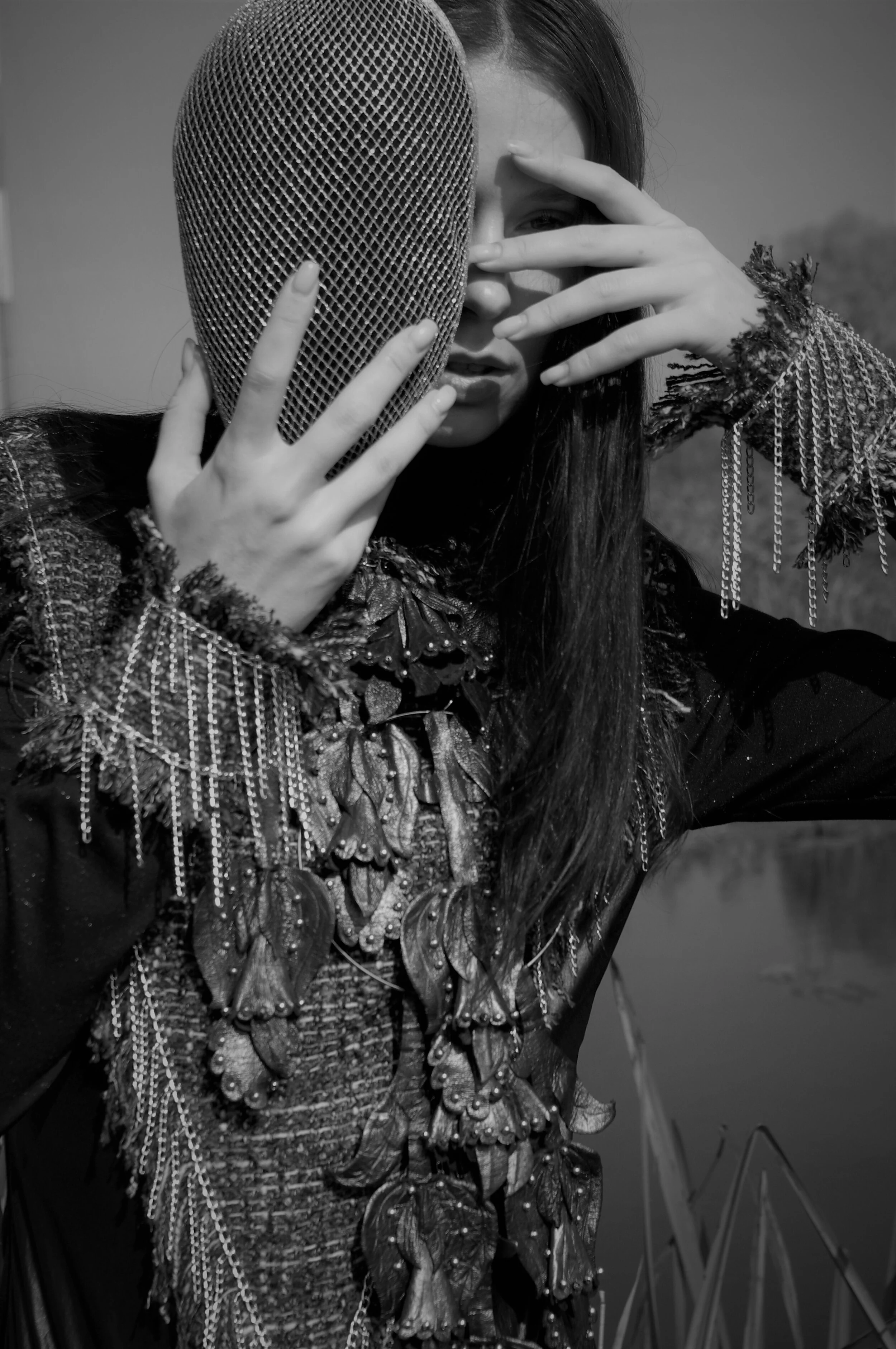 Photographer: Marina Uralskaya Fashion Designer: Marina Uralskaya Model: Valentina Gorbacheva Wardrobe Credits: Silver mask , leather necklace, tweed and jersy bodysuit by Marina Uralskaya