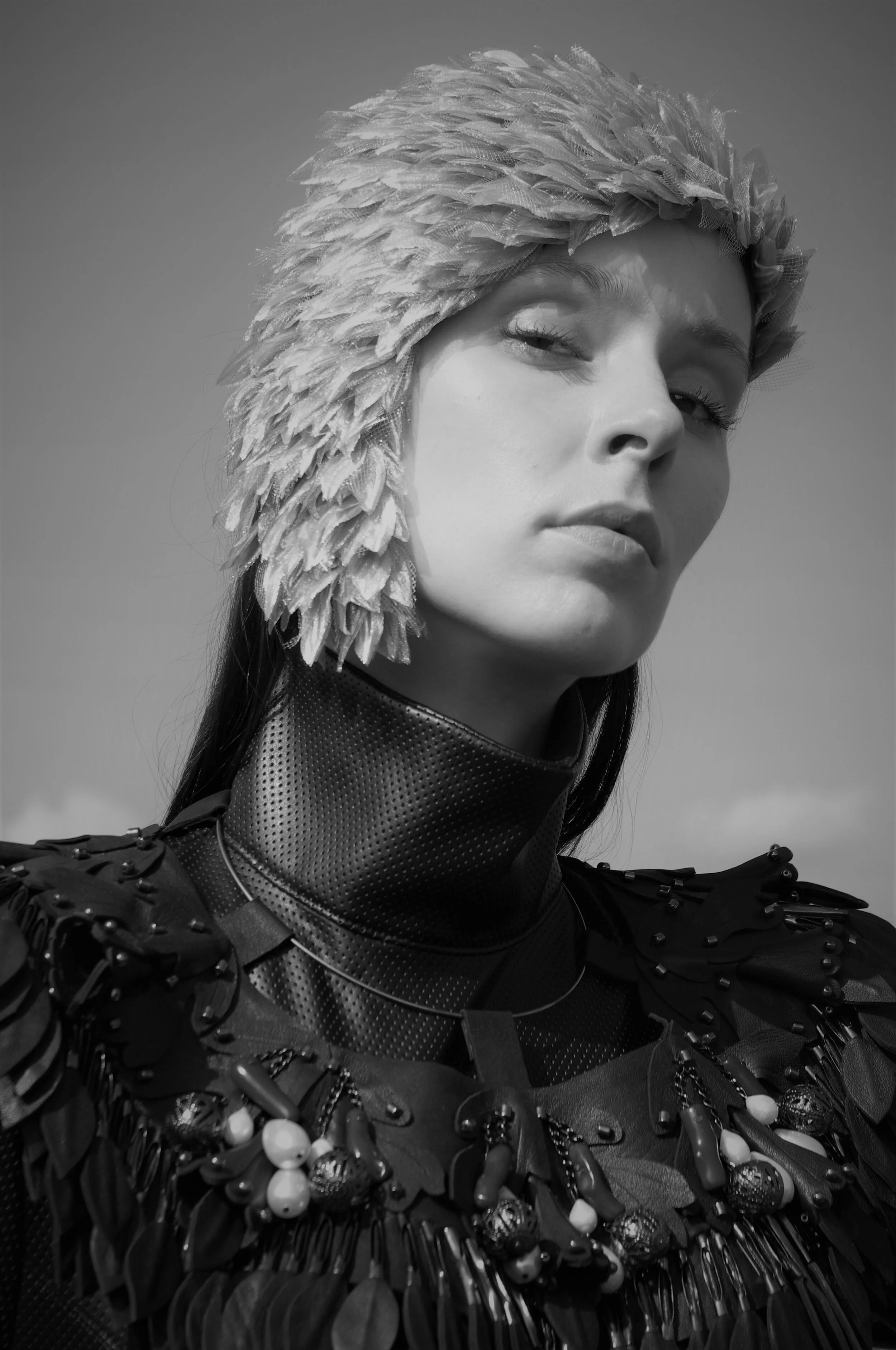 Photographer: Marina Uralskaya Model: Valentina Gorbacheva Fashion Designer: Marina Uralskaya Wardrobe Credits: Organza and tulle headdress, leather and corals cape, leather bodysuit by Marina Uralskaya