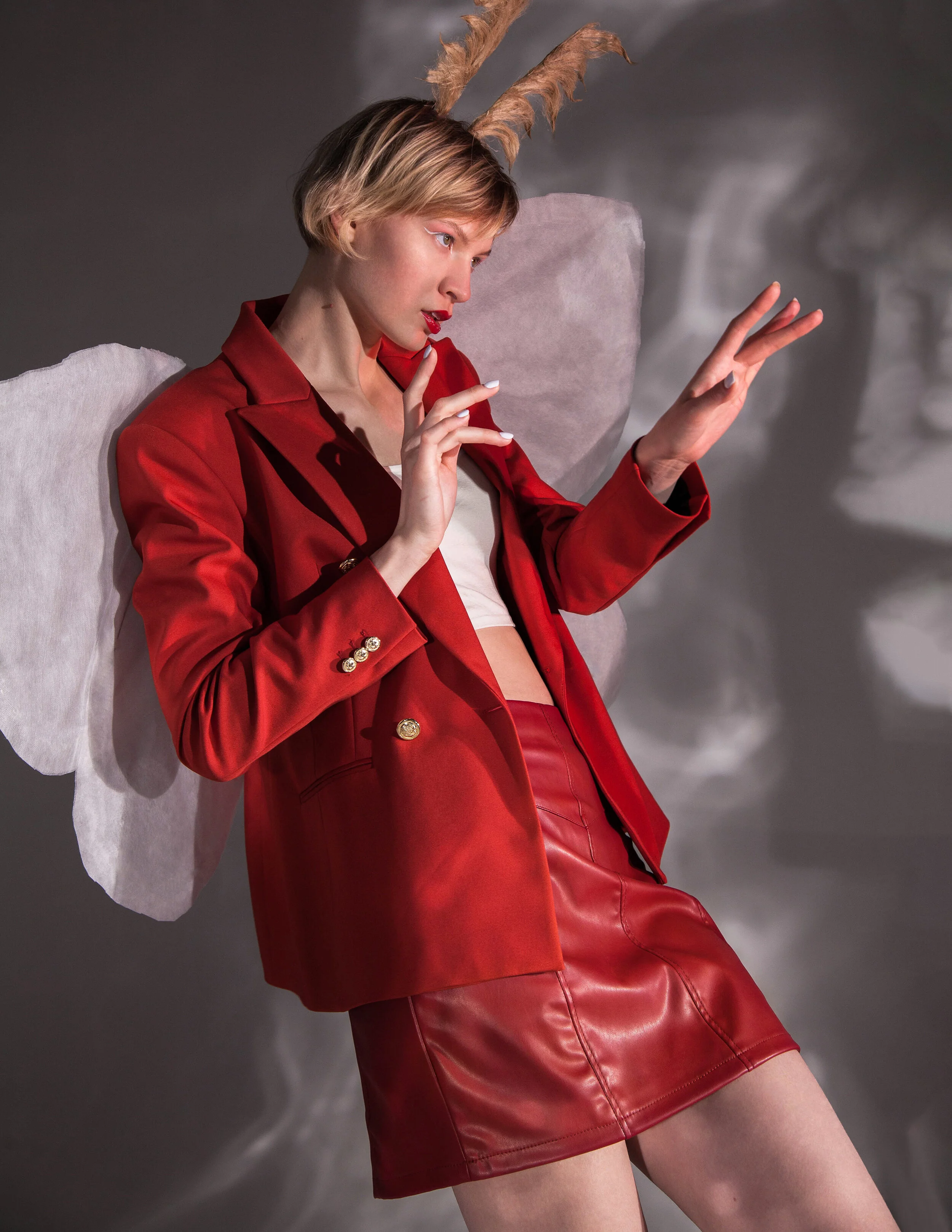 Wardrobe Stylist/Photographer/Retoucher: Nika Jakhaeva Female Model: Maria Klets Makeup Artist/Accessory Designer: Olesya Morgunova Wardrobe Credits: jacket, shoes,top: ZARA skirt: Mohito the wings and horns on the head are the property o